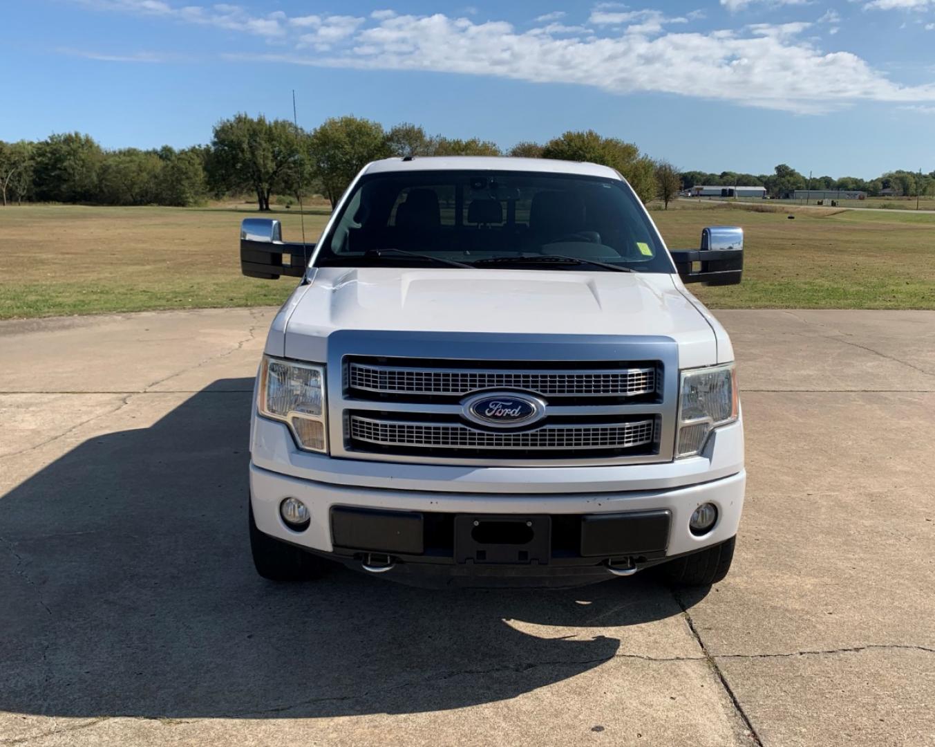 2012 White Ford F-150 XLT PLATINUM SUPER CREW 5.5-FT. BED 4WD (1FTFW1E66CF) with an 6.2L V8 SOHC 16V engine, 6-Speed Automatic transmission, located at 17760 Hwy 62, Morris, OK, 74445, (918) 733-4887, 35.609104, -95.877060 - 2012 FORD F-150 XLT PLATINUM 6.2L V8 4X4. THIS TRUCK RUNS ON GASOLINE AND FEATURES REMOTE KEYLESS ENTRY, REMOTE LOCKING SYSTEM, POWER LOCKS, POWER WINDOWS, POWER MIRRORS, POWER SEATS, TILT WHEEL, MULTIFUNCTION STEERING WHEEL CONTROLS, AM/FM RADIO, CD PLAYER, BLUETOOTH, NAVIGATION, BACKUP CAMERA, LEA - Photo#1