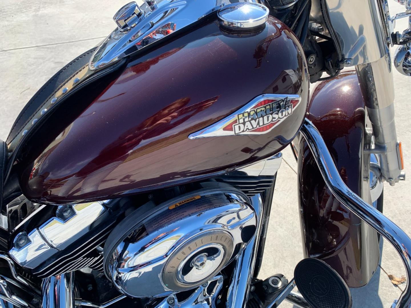 2009 PURPLE Harley-Davidson FLSTC - (1HD1BW5199Y) , located at 17760 HWY 62, MORRIS, 74445, 35.609104, -95.877060 - 2009 HARLEY- DAVIDSON FLSTC HERITAGE SOFTAIL 1584CC FEATURES CRUISE CONTROL, CHROME PASSING LAMPS, CHROME STAGGERED SHORTY EXHAUST WITH DUAL MUFFLERS, STUDDED LEATHER SADDLEBAGS, AND A FULL WINDSHIELD. A SMOOTH RIDE FOR LONG-RANGE TOURING COMFORT. IT RUNS GREAT !! ONLY 14,596 MILES. ** REBUILT TITLE - Photo#10