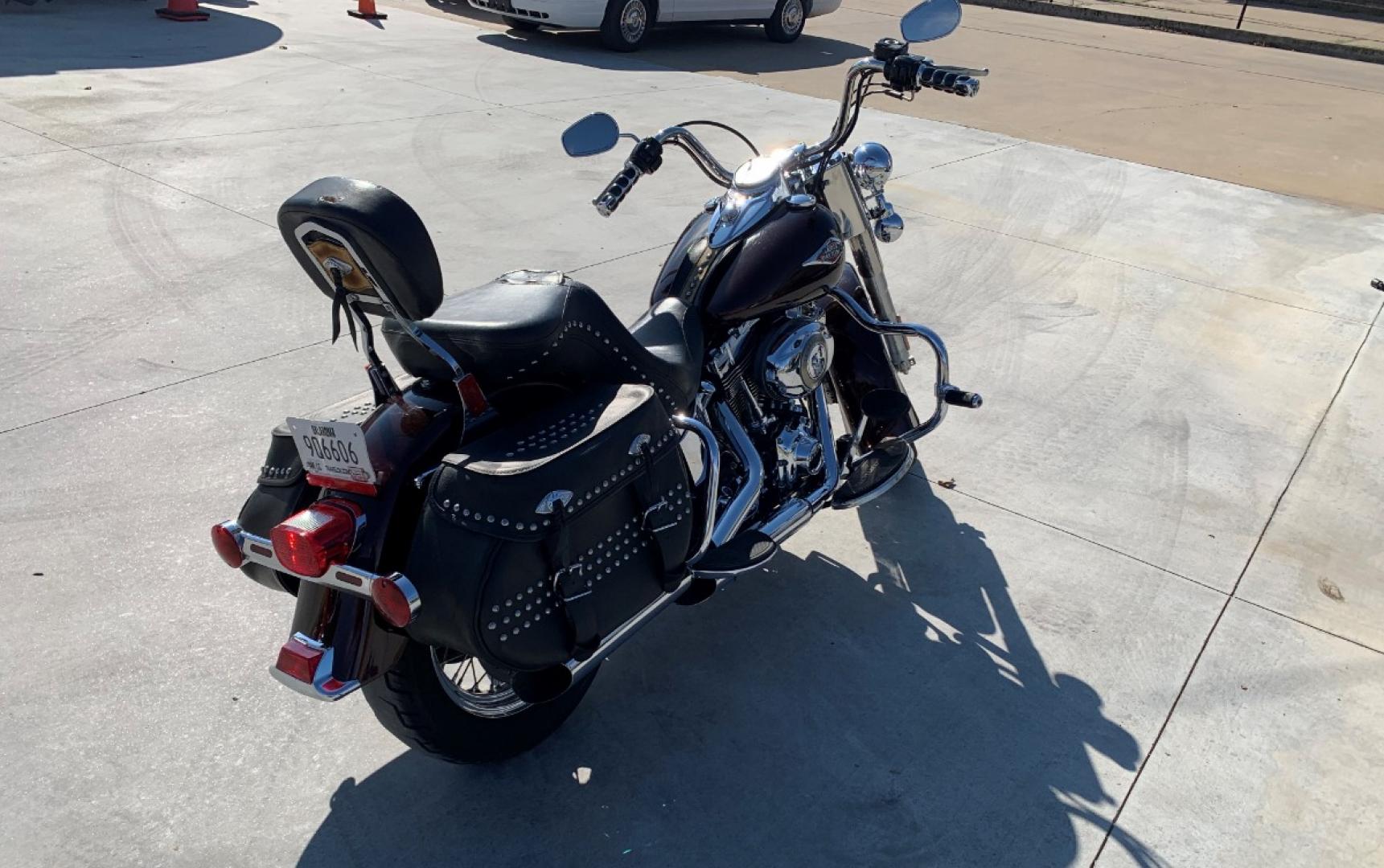 2009 PURPLE Harley-Davidson FLSTC - (1HD1BW5199Y) , located at 17760 HWY 62, MORRIS, 74445, 35.609104, -95.877060 - 2009 HARLEY- DAVIDSON FLSTC HERITAGE SOFTAIL 1584CC FEATURES CRUISE CONTROL, CHROME PASSING LAMPS, CHROME STAGGERED SHORTY EXHAUST WITH DUAL MUFFLERS, STUDDED LEATHER SADDLEBAGS, AND A FULL WINDSHIELD. A SMOOTH RIDE FOR LONG-RANGE TOURING COMFORT. IT RUNS GREAT !! ONLY 14,596 MILES. ** REBUILT TITLE - Photo#5