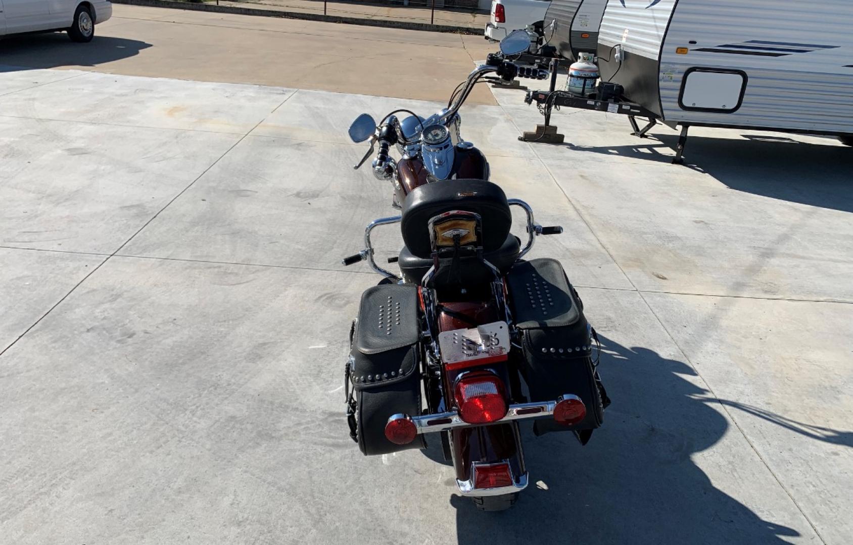 2009 PURPLE Harley-Davidson FLSTC - (1HD1BW5199Y) , located at 17760 HWY 62, MORRIS, 74445, 35.609104, -95.877060 - 2009 HARLEY- DAVIDSON FLSTC HERITAGE SOFTAIL 1584CC FEATURES CRUISE CONTROL, CHROME PASSING LAMPS, CHROME STAGGERED SHORTY EXHAUST WITH DUAL MUFFLERS, STUDDED LEATHER SADDLEBAGS, AND A FULL WINDSHIELD. A SMOOTH RIDE FOR LONG-RANGE TOURING COMFORT. IT RUNS GREAT !! ONLY 14,596 MILES. ** REBUILT TITLE - Photo#6