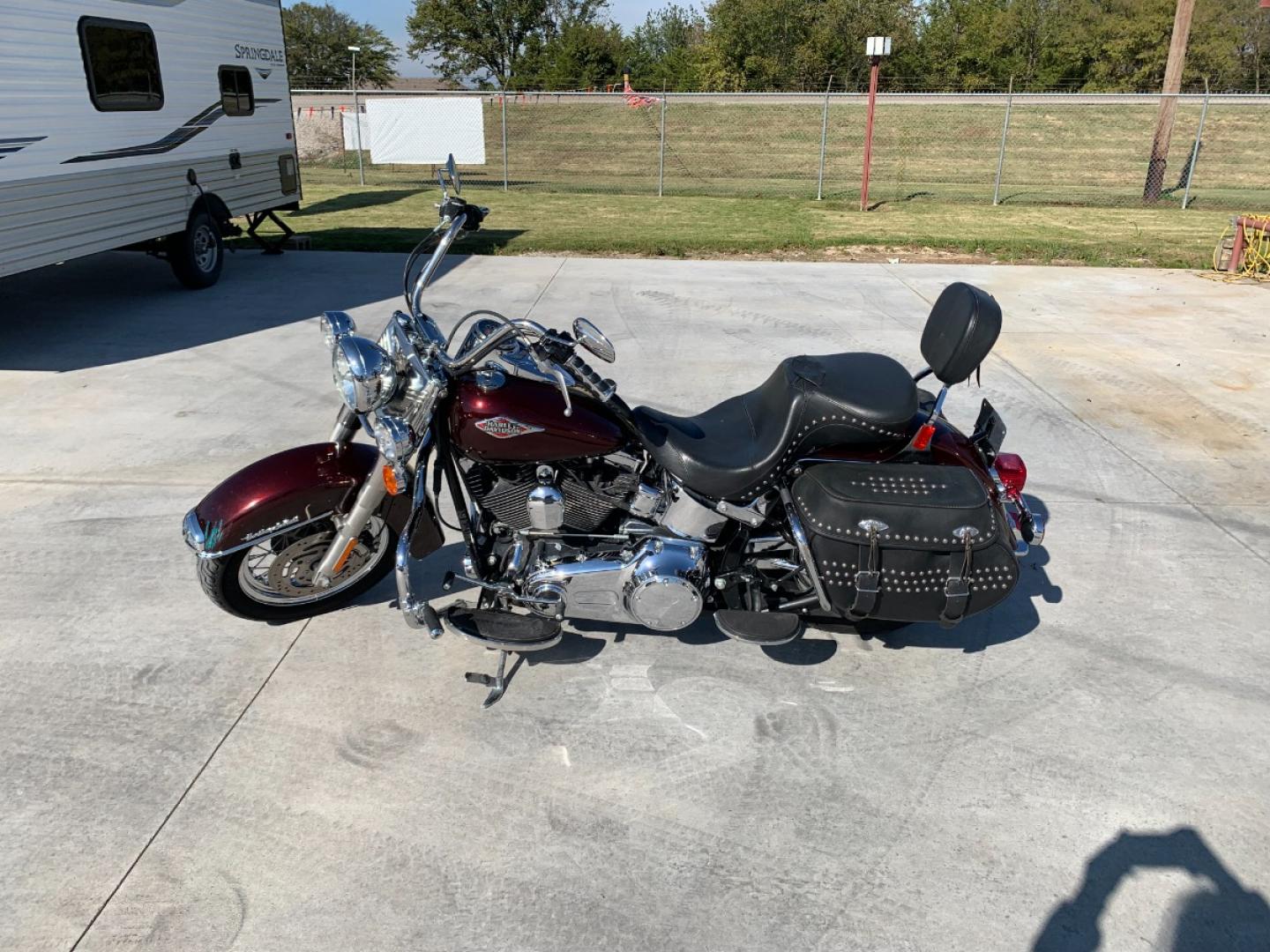 2009 PURPLE Harley-Davidson FLSTC - (1HD1BW5199Y) , located at 17760 HWY 62, MORRIS, 74445, 35.609104, -95.877060 - 2009 HARLEY- DAVIDSON FLSTC HERITAGE SOFTAIL 1584CC FEATURES CRUISE CONTROL, CHROME PASSING LAMPS, CHROME STAGGERED SHORTY EXHAUST WITH DUAL MUFFLERS, STUDDED LEATHER SADDLEBAGS, AND A FULL WINDSHIELD. A SMOOTH RIDE FOR LONG-RANGE TOURING COMFORT. IT RUNS GREAT !! ONLY 14,596 MILES. ** REBUILT TITLE - Photo#8