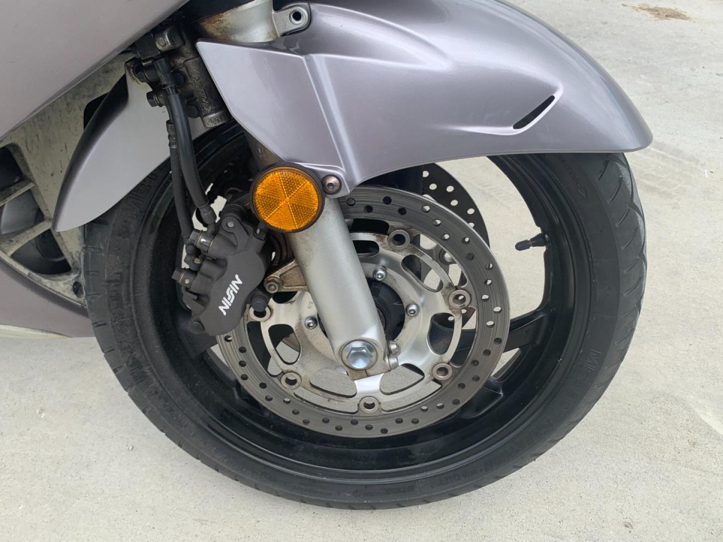 2003 Silver Honda ST1300 ST1300 (JH2SC51103M) with an 1261CC engine, 5 SPEED transmission, located at 17760 HWY 62, MORRIS, 74445, 35.609104, -95.877060 - 2003 HONDA ST1300 1261CC 5-SPEED TRANSMISSION WITH AN ELECTRIC START, POWER-ADJUSTABLE LIGHTS, POWER-ADJUSTABLE WINDSHIELD, NICE CLEAN TOURING SPORTS BIKE. ONLY 17,093 MILES, MARATHON TIRES, IT HAS REBUILT TITLE DUE TO A SMALL ACCIDENT. LIGHT SCRAPES AS SHOWN IN PICTURES. WE OFFER A FREE CARFAX ON - Photo#9