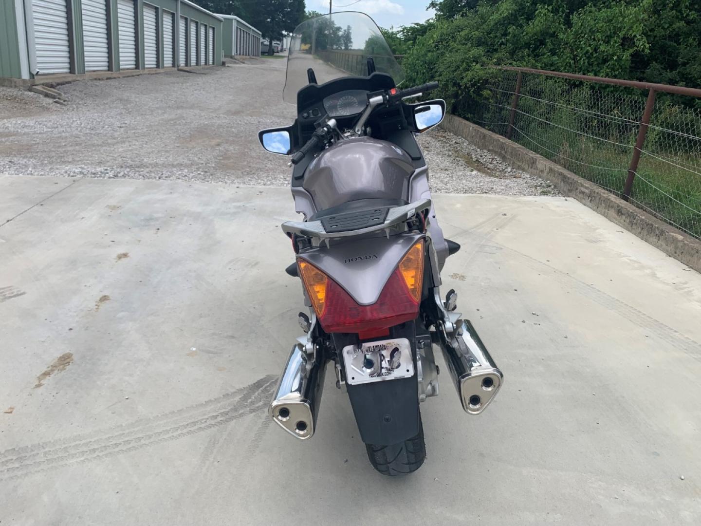 2003 Silver Honda ST1300 ST1300 (JH2SC51103M) with an 1261CC engine, 5 SPEED transmission, located at 17760 HWY 62, MORRIS, 74445, 35.609104, -95.877060 - 2003 HONDA ST1300 1261CC 5-SPEED TRANSMISSION WITH AN ELECTRIC START, POWER-ADJUSTABLE LIGHTS, POWER-ADJUSTABLE WINDSHIELD, NICE CLEAN TOURING SPORTS BIKE. ONLY 17,093 MILES, MARATHON TIRES, IT HAS REBUILT TITLE DUE TO A SMALL ACCIDENT. LIGHT SCRAPES AS SHOWN IN PICTURES. WE OFFER A FREE CARFAX ON - Photo#4