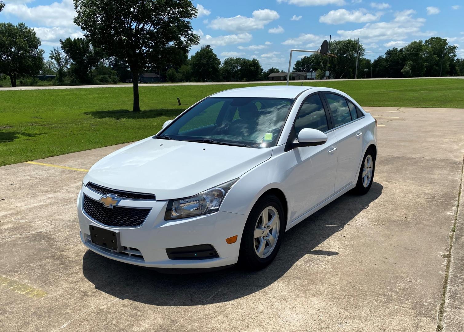 2014 White /GRAY Chevrolet Cruze ECO (1G1PK5SBXE7) with an 1.4L L4 DOHC 16V TURBO FFV engine, AUTOMATIC transmission, located at 17760 Hwy 62, Morris, OK, 74445, (918) 733-4887, 35.609104, -95.877060 - 2014 CHEVROLET CRUZE 1.4L L4 DOHC 16V TURBO FFV FWD, A BI-FUEL FUELING SYSTEM THAT RUNS ON CNG (COMPRESSED NATURAL GAS) OR GASOLINE. GREAT FOR YOUR EVERYDAY COMMUTE 42 MPG!!!!! THE CHEVROLET CRUZE FEATURES POWER LOCKS, POWER WINDOWS, POWER MIRRORS, MANUAL SEATS, CLOTH SEATS, AM/FM RADIO, CD PLAYER, - Photo#0