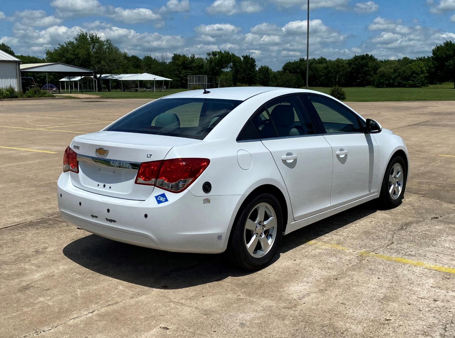 2014 White /GRAY Chevrolet Cruze ECO (1G1PK5SBXE7) with an 1.4L L4 DOHC 16V TURBO FFV engine, AUTOMATIC transmission, located at 17760 Hwy 62, Morris, OK, 74445, (918) 733-4887, 35.609104, -95.877060 - 2014 CHEVROLET CRUZE 1.4L L4 DOHC 16V TURBO FFV FWD, A BI-FUEL FUELING SYSTEM THAT RUNS ON CNG (COMPRESSED NATURAL GAS) OR GASOLINE. GREAT FOR YOUR EVERYDAY COMMUTE 42 MPG!!!!! THE CHEVROLET CRUZE FEATURES POWER LOCKS, POWER WINDOWS, POWER MIRRORS, MANUAL SEATS, CLOTH SEATS, AM/FM RADIO, CD PLAYER, - Photo#4