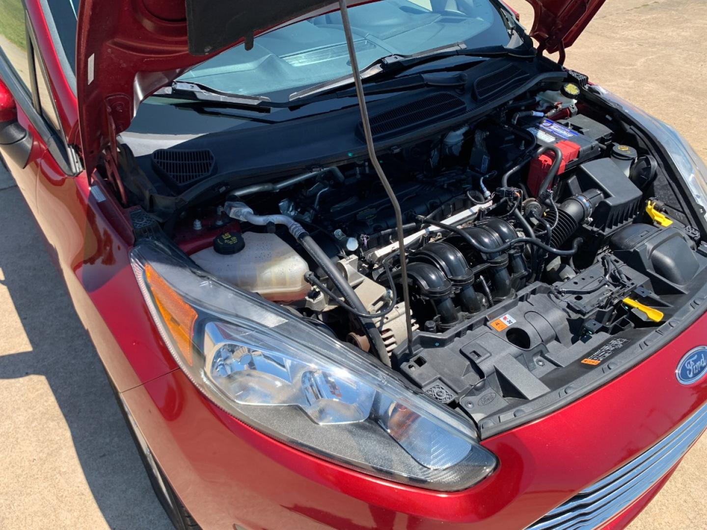 2014 RED Ford Fiesta SE Sedan (3FADP4BJ6EM) with an 1.6L L4 DOHC 16V engine, located at 17760 Hwy 62, Morris, OK, 74445, (918) 733-4887, 35.609104, -95.877060 - 2014 FORD FIESTA SE 1.6L 4 CYLINDER FWD, FEATURES KEYLESS ENTRY REMOTE, POWER LOCKS, POWER WINDOWS, POWER MIRRORS, MANUAL SEATS, AM/FM STEREO, CD PLAYER, BLUETOOTH, CLOTH SEATS, CRUISE CONTROL, HANDS-FREE CALLING, VOICE COMMAND CONTROL, MULTI-FUNCTION STEERING WHEEL CONTROLS. 108,726 MILES 195/60R15 - Photo#17