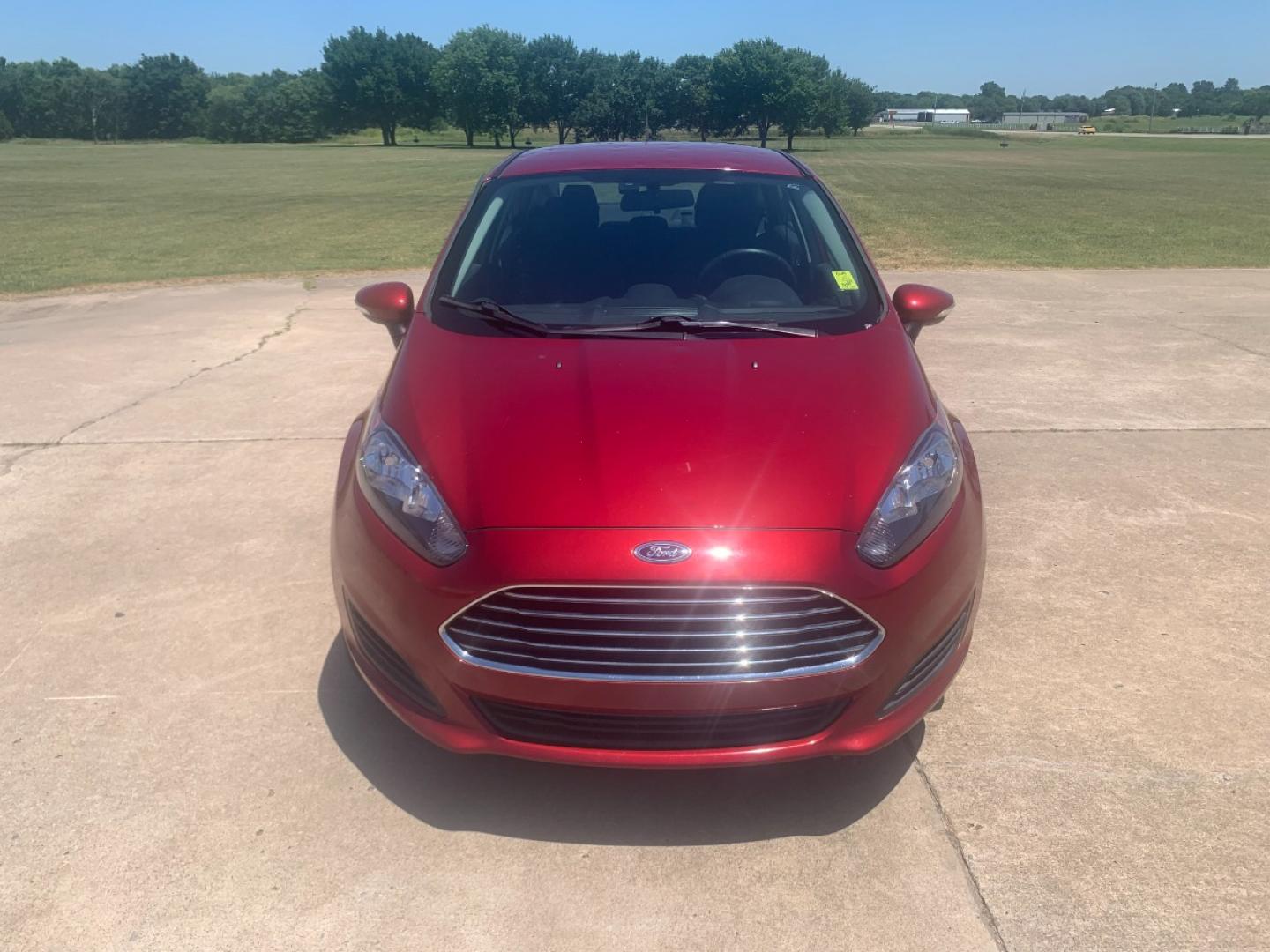 2014 RED Ford Fiesta SE Sedan (3FADP4BJ6EM) with an 1.6L L4 DOHC 16V engine, located at 17760 Hwy 62, Morris, OK, 74445, (918) 733-4887, 35.609104, -95.877060 - 2014 FORD FIESTA SE 1.6L 4 CYLINDER FWD, FEATURES KEYLESS ENTRY REMOTE, POWER LOCKS, POWER WINDOWS, POWER MIRRORS, MANUAL SEATS, AM/FM STEREO, CD PLAYER, BLUETOOTH, CLOTH SEATS, CRUISE CONTROL, HANDS-FREE CALLING, VOICE COMMAND CONTROL, MULTI-FUNCTION STEERING WHEEL CONTROLS. 108,726 MILES 195/60R15 - Photo#1