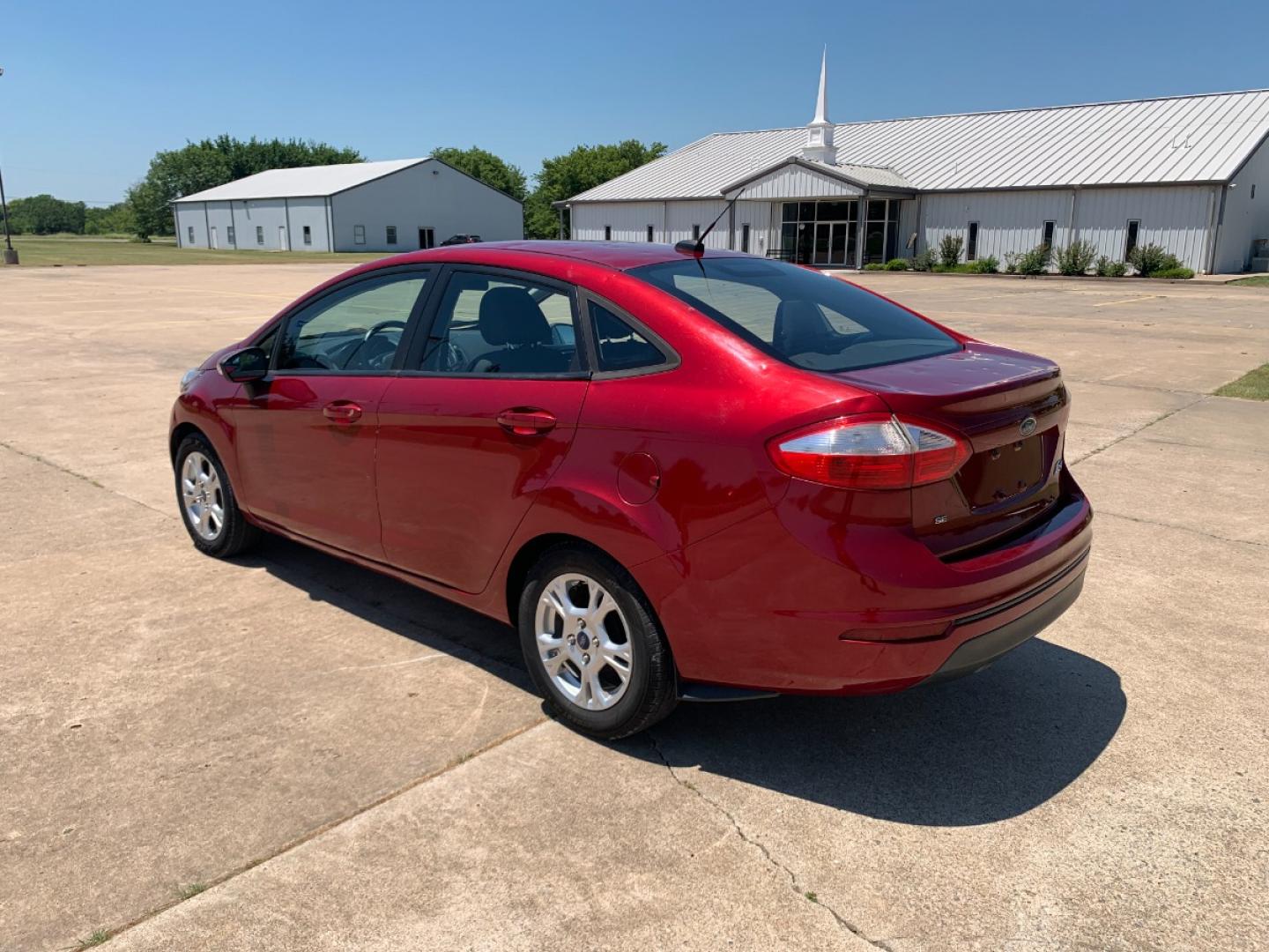 2014 RED Ford Fiesta SE Sedan (3FADP4BJ6EM) with an 1.6L L4 DOHC 16V engine, located at 17760 Hwy 62, Morris, OK, 74445, (918) 733-4887, 35.609104, -95.877060 - 2014 FORD FIESTA SE 1.6L 4 CYLINDER FWD, FEATURES KEYLESS ENTRY REMOTE, POWER LOCKS, POWER WINDOWS, POWER MIRRORS, MANUAL SEATS, AM/FM STEREO, CD PLAYER, BLUETOOTH, CLOTH SEATS, CRUISE CONTROL, HANDS-FREE CALLING, VOICE COMMAND CONTROL, MULTI-FUNCTION STEERING WHEEL CONTROLS. 108,726 MILES 195/60R15 - Photo#6