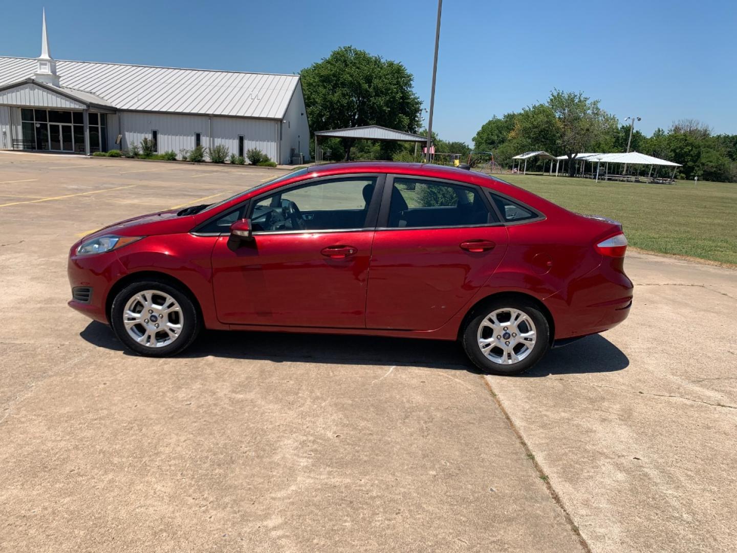 2014 RED Ford Fiesta SE Sedan (3FADP4BJ6EM) with an 1.6L L4 DOHC 16V engine, located at 17760 Hwy 62, Morris, OK, 74445, (918) 733-4887, 35.609104, -95.877060 - 2014 FORD FIESTA SE 1.6L 4 CYLINDER FWD, FEATURES KEYLESS ENTRY REMOTE, POWER LOCKS, POWER WINDOWS, POWER MIRRORS, MANUAL SEATS, AM/FM STEREO, CD PLAYER, BLUETOOTH, CLOTH SEATS, CRUISE CONTROL, HANDS-FREE CALLING, VOICE COMMAND CONTROL, MULTI-FUNCTION STEERING WHEEL CONTROLS. 108,726 MILES 195/60R15 - Photo#7