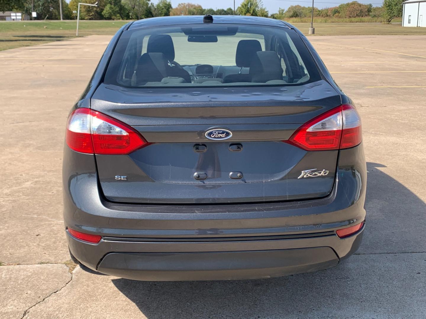 2017 GRAY Ford Fiesta SE Sedan (3FADP4BJXHM) with an 1.6L L4 DOHC 16V engine, located at 17760 Hwy 62, Morris, OK, 74445, (918) 733-4887, 35.609104, -95.877060 - 2017 FORD FIESTA SE 1.6L 4-CYLINDER FWD, RUNS ON GASOLINE, YOU WILL SAVE AT THE GAS PUMP WITH THIS FORD IT GETS 35 MPG. FEATURES A KEYLESS ENTRY REMOTE, POWER LOCKS, POWER WINDOWS, POWER MIRRORS, MANUAL SEATS, AM/FM STEREO, CD PLAYER, BLUETOOTH, CLOTH SEATS, CRUISE CONTROL, HANDS-FREE CALLING, VOICE - Photo#5