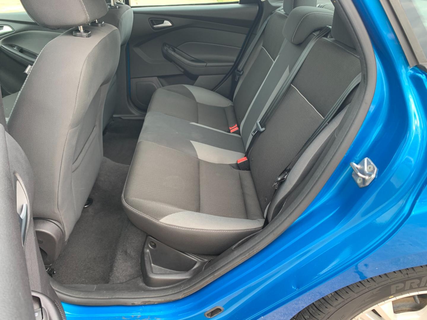 2014 BLUE Ford Focus SE Sedan (1FADP3F25EL) with an 2.0L L4 DOHC 16V engine, AUTOMATIC transmission, located at 17760 Hwy 62, Morris, OK, 74445, (918) 733-4887, 35.609104, -95.877060 - 2014 FORD FOCUS SE HAS A 2.0L 4-CYLINDER FEATURES POWER REMOTE LOCKING SYSTEM, POWER WINDOWS, POWER LOCKS, POWER WINDOWS, POWER MIRRORS, CD PLAYER, AM/FM STEREO, AUX PORT, USB PORT, CLOTH INTERIOR, BLUETOOTH, CRUISE CONTROL, MULTIFUNCTION STEERING WHEEL CONTROL, VOICE COMMAND CONTROL. DOES HAVE REB - Photo#14