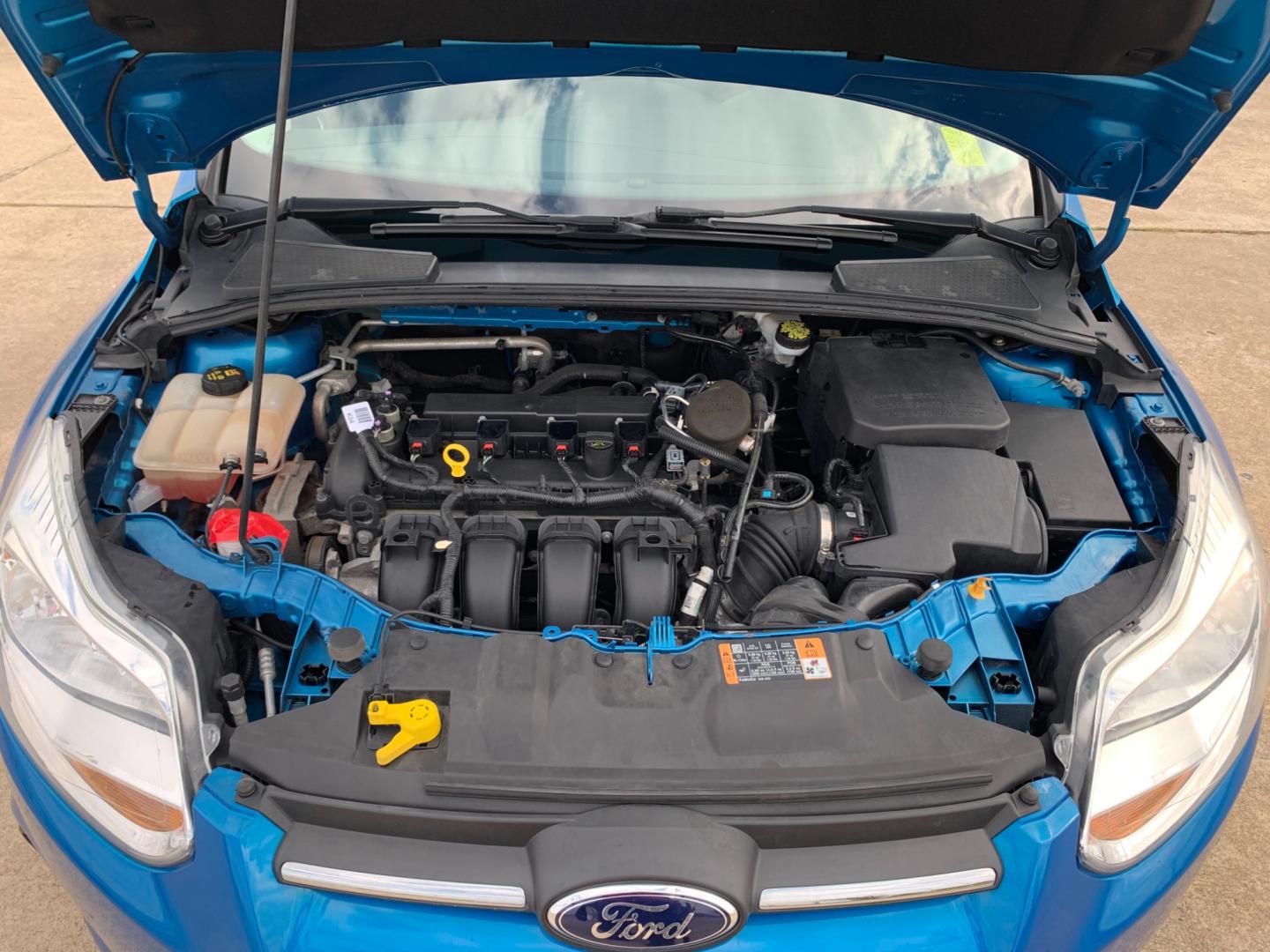 2014 BLUE Ford Focus SE Sedan (1FADP3F25EL) with an 2.0L L4 DOHC 16V engine, AUTOMATIC transmission, located at 17760 Hwy 62, Morris, OK, 74445, (918) 733-4887, 35.609104, -95.877060 - 2014 FORD FOCUS SE HAS A 2.0L 4-CYLINDER FEATURES POWER REMOTE LOCKING SYSTEM, POWER WINDOWS, POWER LOCKS, POWER WINDOWS, POWER MIRRORS, CD PLAYER, AM/FM STEREO, AUX PORT, USB PORT, CLOTH INTERIOR, BLUETOOTH, CRUISE CONTROL, MULTIFUNCTION STEERING WHEEL CONTROL, VOICE COMMAND CONTROL. DOES HAVE REB - Photo#16