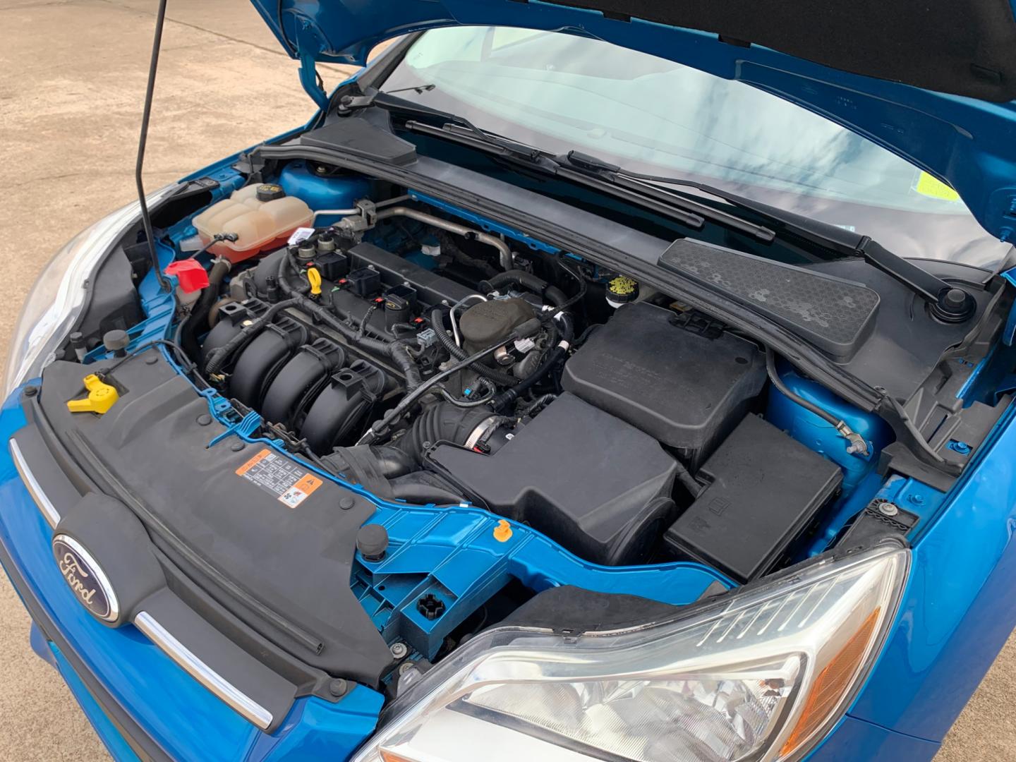 2014 BLUE Ford Focus SE Sedan (1FADP3F25EL) with an 2.0L L4 DOHC 16V engine, AUTOMATIC transmission, located at 17760 Hwy 62, Morris, OK, 74445, (918) 733-4887, 35.609104, -95.877060 - 2014 FORD FOCUS SE HAS A 2.0L 4-CYLINDER FEATURES POWER REMOTE LOCKING SYSTEM, POWER WINDOWS, POWER LOCKS, POWER WINDOWS, POWER MIRRORS, CD PLAYER, AM/FM STEREO, AUX PORT, USB PORT, CLOTH INTERIOR, BLUETOOTH, CRUISE CONTROL, MULTIFUNCTION STEERING WHEEL CONTROL, VOICE COMMAND CONTROL. DOES HAVE REB - Photo#17