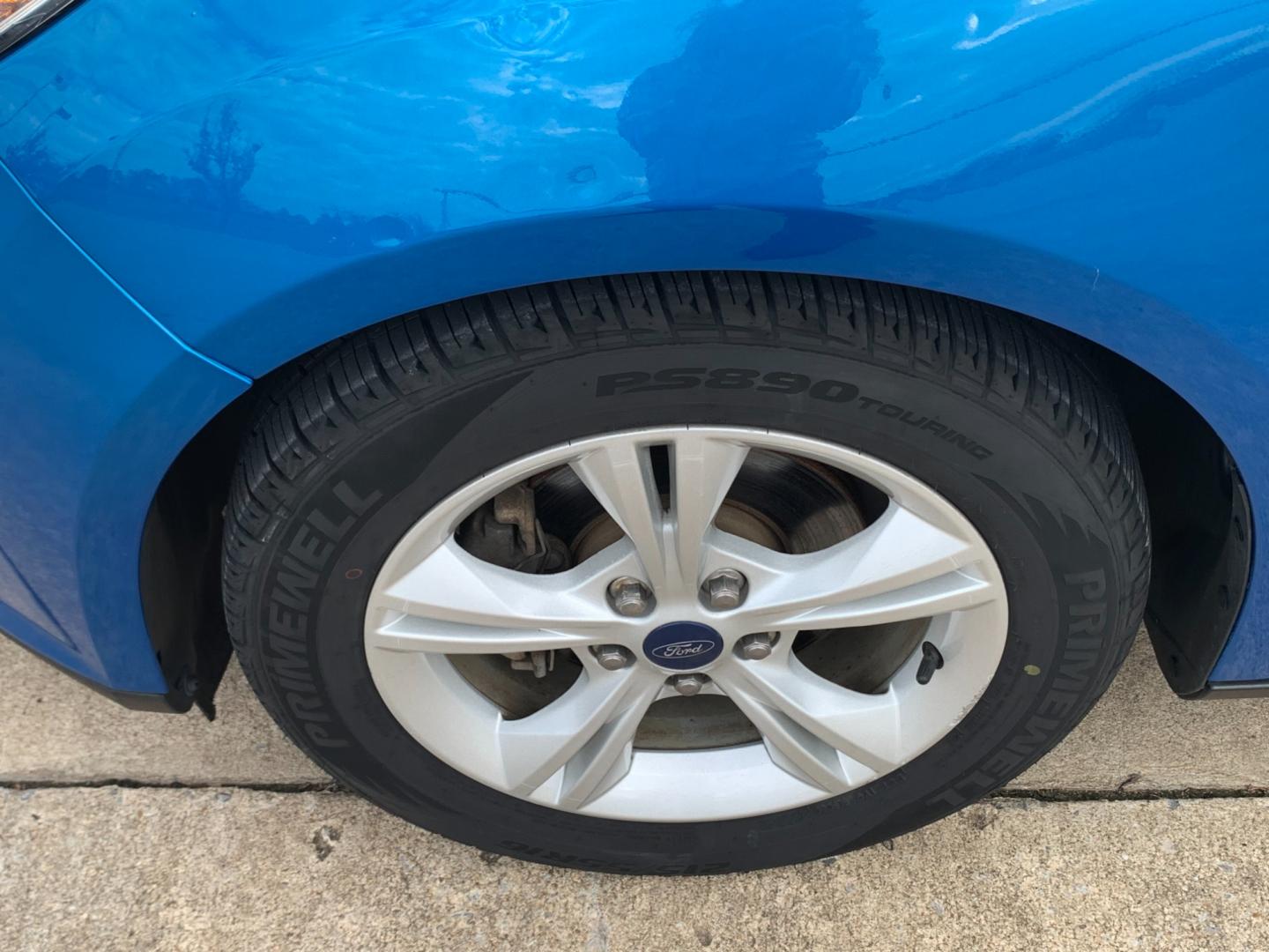 2014 BLUE Ford Focus SE Sedan (1FADP3F25EL) with an 2.0L L4 DOHC 16V engine, AUTOMATIC transmission, located at 17760 Hwy 62, Morris, OK, 74445, (918) 733-4887, 35.609104, -95.877060 - 2014 FORD FOCUS SE HAS A 2.0L 4-CYLINDER FEATURES POWER REMOTE LOCKING SYSTEM, POWER WINDOWS, POWER LOCKS, POWER WINDOWS, POWER MIRRORS, CD PLAYER, AM/FM STEREO, AUX PORT, USB PORT, CLOTH INTERIOR, BLUETOOTH, CRUISE CONTROL, MULTIFUNCTION STEERING WHEEL CONTROL, VOICE COMMAND CONTROL. DOES HAVE REB - Photo#20