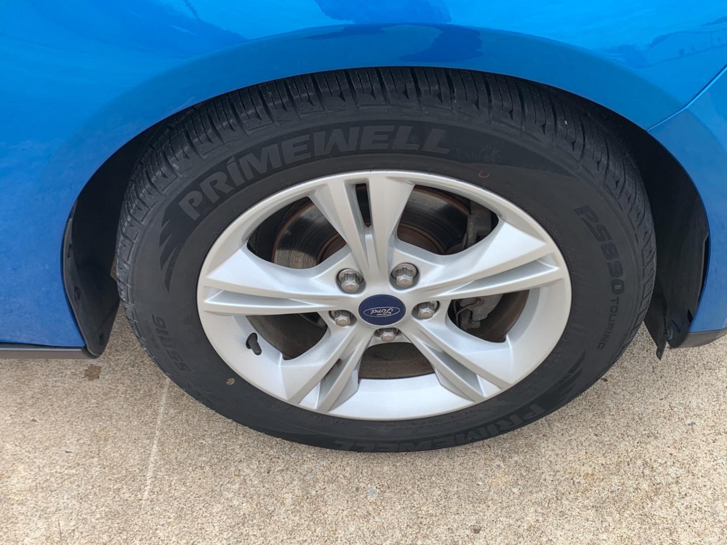 2014 BLUE Ford Focus SE Sedan (1FADP3F25EL) with an 2.0L L4 DOHC 16V engine, AUTOMATIC transmission, located at 17760 Hwy 62, Morris, OK, 74445, (918) 733-4887, 35.609104, -95.877060 - 2014 FORD FOCUS SE HAS A 2.0L 4-CYLINDER FEATURES POWER REMOTE LOCKING SYSTEM, POWER WINDOWS, POWER LOCKS, POWER WINDOWS, POWER MIRRORS, CD PLAYER, AM/FM STEREO, AUX PORT, USB PORT, CLOTH INTERIOR, BLUETOOTH, CRUISE CONTROL, MULTIFUNCTION STEERING WHEEL CONTROL, VOICE COMMAND CONTROL. DOES HAVE REB - Photo#21