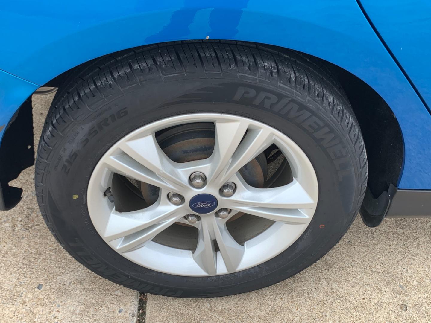 2014 BLUE Ford Focus SE Sedan (1FADP3F25EL) with an 2.0L L4 DOHC 16V engine, AUTOMATIC transmission, located at 17760 Hwy 62, Morris, OK, 74445, (918) 733-4887, 35.609104, -95.877060 - 2014 FORD FOCUS SE HAS A 2.0L 4-CYLINDER FEATURES POWER REMOTE LOCKING SYSTEM, POWER WINDOWS, POWER LOCKS, POWER WINDOWS, POWER MIRRORS, CD PLAYER, AM/FM STEREO, AUX PORT, USB PORT, CLOTH INTERIOR, BLUETOOTH, CRUISE CONTROL, MULTIFUNCTION STEERING WHEEL CONTROL, VOICE COMMAND CONTROL. DOES HAVE REB - Photo#22