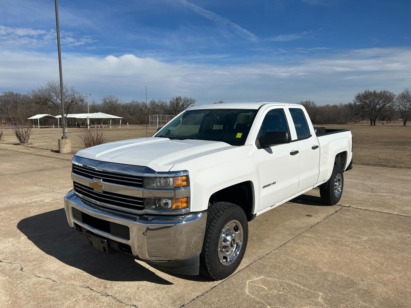 2015 White Chevrolet Silverado 2500HD Work Truck Double Cab 2WD (1GC2CUEB5FZ) with an 6.0L V8 OHV 16V CNG engine, 6A transmission, located at 17760 Hwy 62, Morris, OK, 74445, (918) 733-4887, 35.609104, -95.877060 - 2015 CHEVY SILVERADO 2500HD HAS THE 6.0L V8 AND IS RWD. THIS IS A BI-FUEL TRUCK THAT RUNS ON BOTH CNG OR GASOLINE, FEATURES REMOTE KEYLESS ENTRY, POWER LOCKS, POWER WINDOWS, POWER MIRRORS, MANUAL SEATS, AM/FM STEREO, USB PORT, AUX PORT, LEATHER SEATS, TRACTION CONTROL, BEDLINER, FACTORY-EQUIPPED TRA - Photo#0