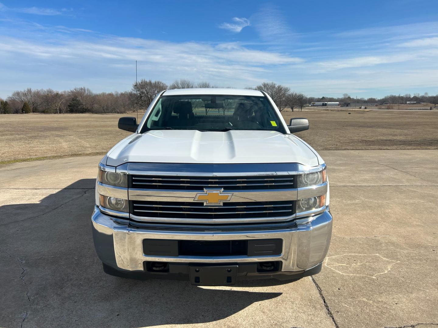 2015 White Chevrolet Silverado 2500HD Work Truck Double Cab 2WD (1GC2CUEB5FZ) with an 6.0L V8 OHV 16V CNG engine, 6A transmission, located at 17760 Hwy 62, Morris, OK, 74445, (918) 733-4887, 35.609104, -95.877060 - 2015 CHEVY SILVERADO 2500HD HAS THE 6.0L V8 AND IS RWD. THIS IS A BI-FUEL TRUCK THAT RUNS ON BOTH CNG OR GASOLINE, FEATURES REMOTE KEYLESS ENTRY, POWER LOCKS, POWER WINDOWS, POWER MIRRORS, MANUAL SEATS, AM/FM STEREO, USB PORT, AUX PORT, LEATHER SEATS, TRACTION CONTROL, BEDLINER, FACTORY-EQUIPPED TRA - Photo#1