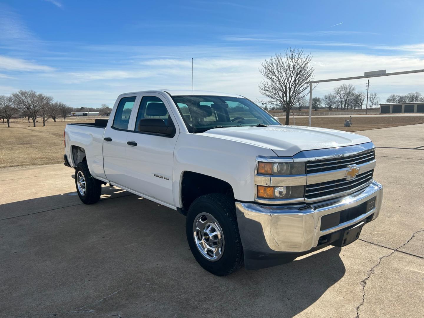 2015 White Chevrolet Silverado 2500HD Work Truck Double Cab 2WD (1GC2CUEB5FZ) with an 6.0L V8 OHV 16V CNG engine, 6A transmission, located at 17760 Hwy 62, Morris, OK, 74445, (918) 733-4887, 35.609104, -95.877060 - 2015 CHEVY SILVERADO 2500HD HAS THE 6.0L V8 AND IS RWD. THIS IS A BI-FUEL TRUCK THAT RUNS ON BOTH CNG OR GASOLINE, FEATURES REMOTE KEYLESS ENTRY, POWER LOCKS, POWER WINDOWS, POWER MIRRORS, MANUAL SEATS, AM/FM STEREO, USB PORT, AUX PORT, LEATHER SEATS, TRACTION CONTROL, BEDLINER, FACTORY-EQUIPPED TRA - Photo#2