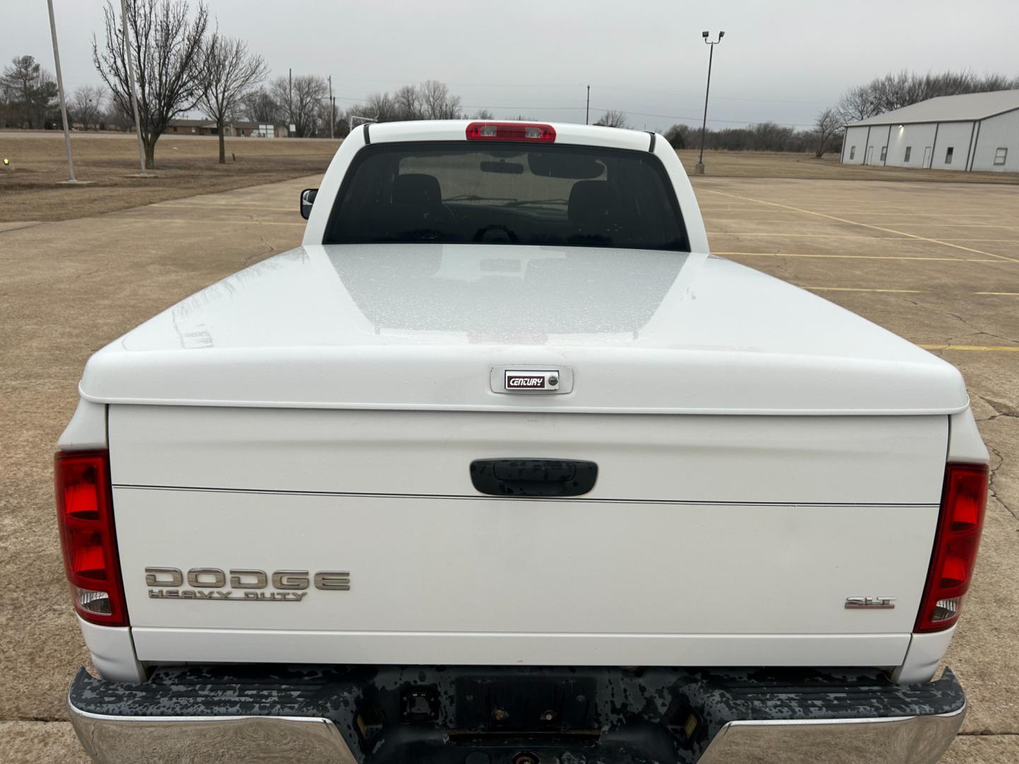 2004 White Dodge Ram 2500 Laramie Quad Cab 2WD (3D7KA28C94G) with an 5.9L L6 OHV 24V TURBO DIESEL engine, located at 17760 Hwy 62, Morris, OK, 74445, (918) 733-4887, 35.609104, -95.877060 - Photo#16