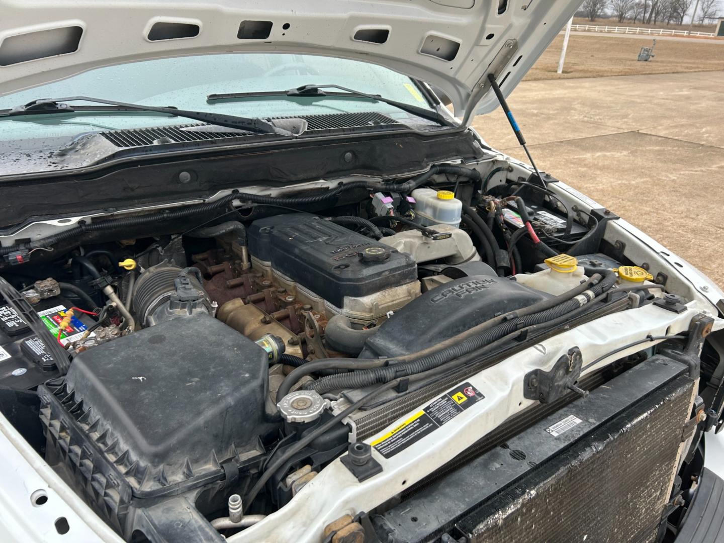 2004 White Dodge Ram 2500 Laramie Quad Cab 2WD (3D7KA28C94G) with an 5.9L L6 OHV 24V TURBO DIESEL engine, located at 17760 Hwy 62, Morris, OK, 74445, (918) 733-4887, 35.609104, -95.877060 - Photo#20