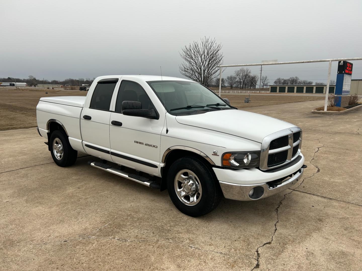 2004 White Dodge Ram 2500 Laramie Quad Cab 2WD (3D7KA28C94G) with an 5.9L L6 OHV 24V TURBO DIESEL engine, located at 17760 Hwy 62, Morris, OK, 74445, (918) 733-4887, 35.609104, -95.877060 - Photo#2