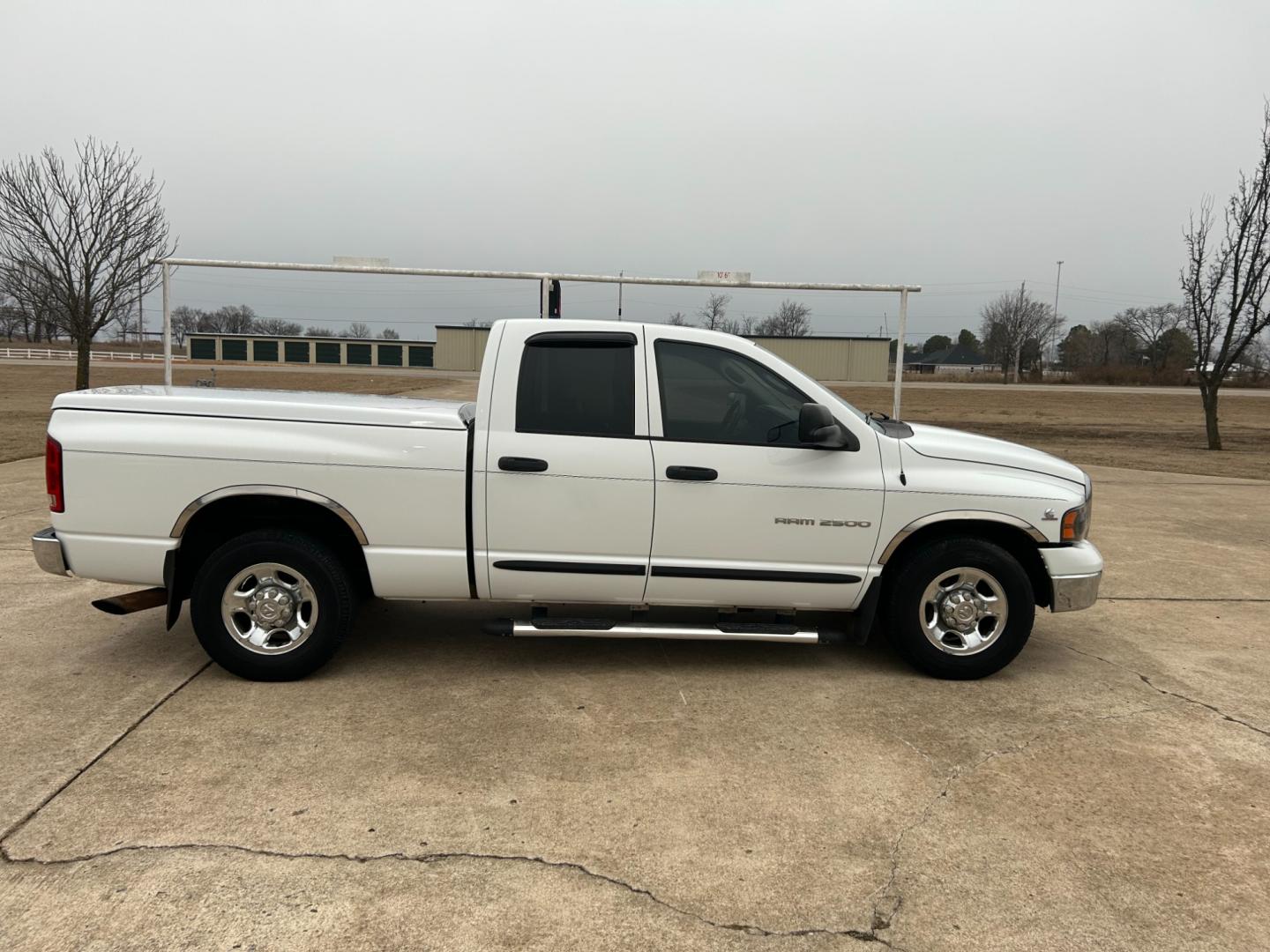 2004 White Dodge Ram 2500 Laramie Quad Cab 2WD (3D7KA28C94G) with an 5.9L L6 OHV 24V TURBO DIESEL engine, located at 17760 Hwy 62, Morris, OK, 74445, (918) 733-4887, 35.609104, -95.877060 - Photo#3