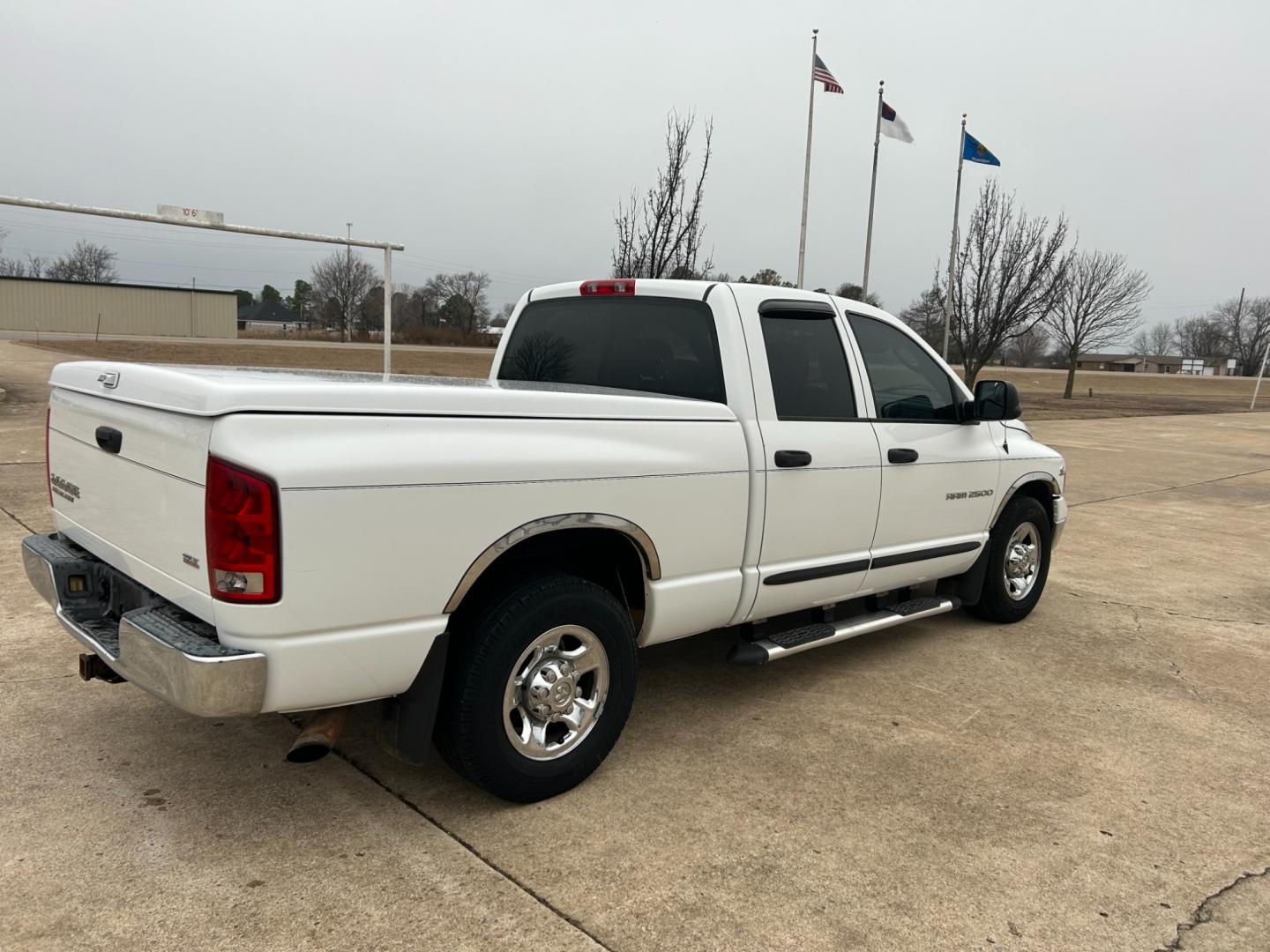 2004 White Dodge Ram 2500 Laramie Quad Cab 2WD (3D7KA28C94G) with an 5.9L L6 OHV 24V TURBO DIESEL engine, located at 17760 Hwy 62, Morris, OK, 74445, (918) 733-4887, 35.609104, -95.877060 - Photo#4