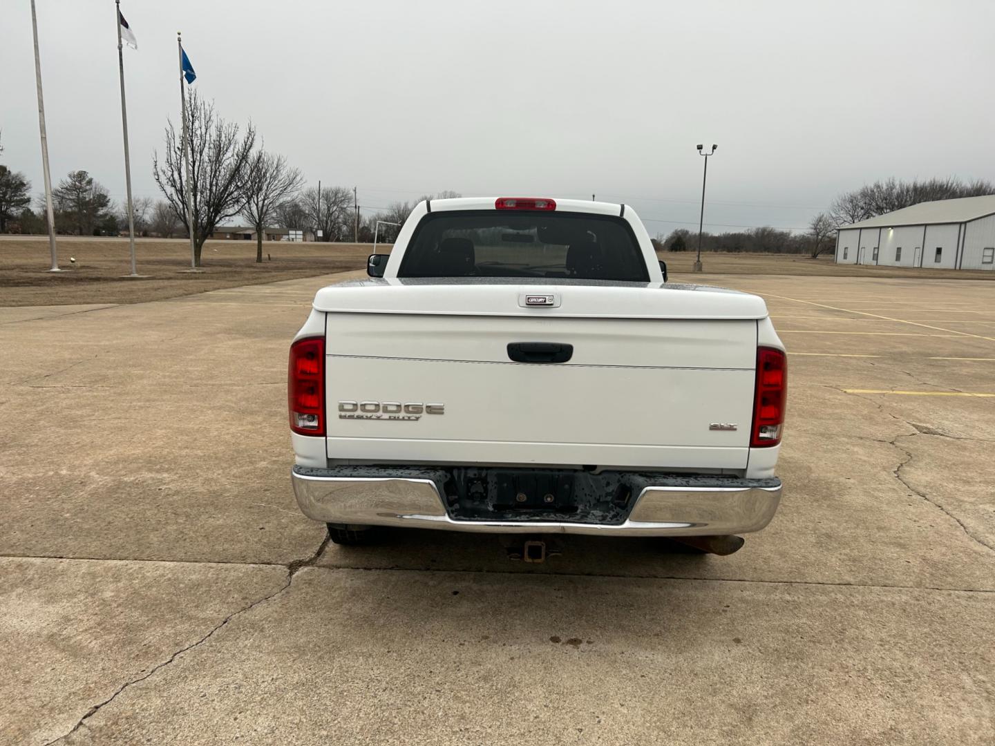 2004 White Dodge Ram 2500 Laramie Quad Cab 2WD (3D7KA28C94G) with an 5.9L L6 OHV 24V TURBO DIESEL engine, located at 17760 Hwy 62, Morris, OK, 74445, (918) 733-4887, 35.609104, -95.877060 - Photo#5