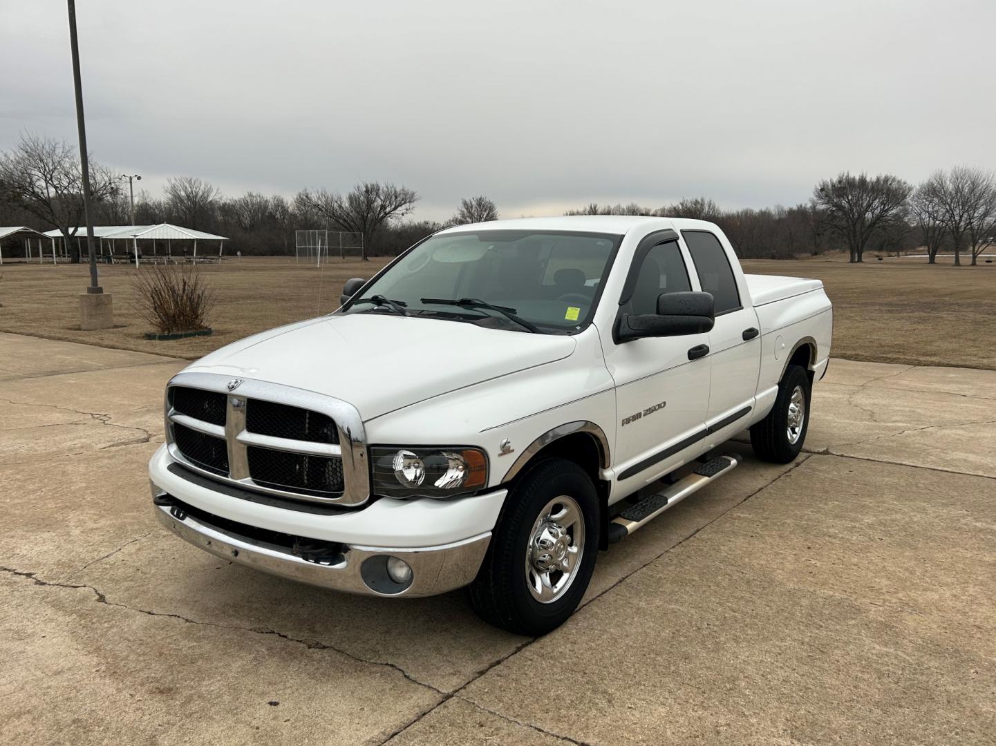 2004 White Dodge Ram 2500 Laramie Quad Cab 2WD (3D7KA28C94G) with an 5.9L L6 OHV 24V TURBO DIESEL engine, located at 17760 Hwy 62, Morris, OK, 74445, (918) 733-4887, 35.609104, -95.877060 - Photo#0