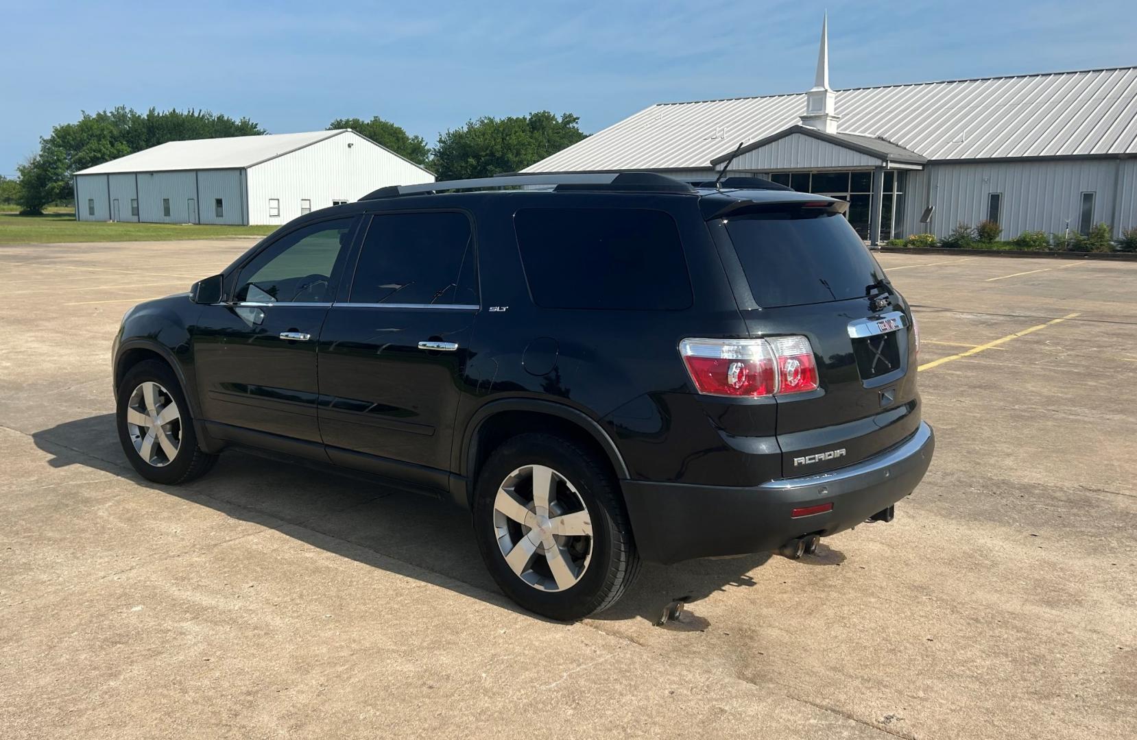 2012 BLACK GMC Acadia SLT-1 FWD (1GKKRRED3CJ) with an 3.6L V6 DOHC 24V engine, 6-Speed Automatic transmission, located at 17760 Hwy 62, Morris, OK, 74445, (918) 733-4887, 35.609104, -95.877060 - 2012 GMC ACADIA SLT-1 FWD FEATURES POWER WINDOWS, POWER LOCKS, POWER SEATS, POWER MIRRORS, CD PLAYER, AUXILLARY PORT, AM/FM STEREO, HEATED SEATS, CRUISE CONTROL, TRACTION CONTROL, BACKUP CAMERA. CLEAN TITLE WITH 136,854 MILES. MICHELIN 255/60R16 TIRES. *******DOES HAVE SCRATCHES AS SHOWN IN PICTURES - Photo#6