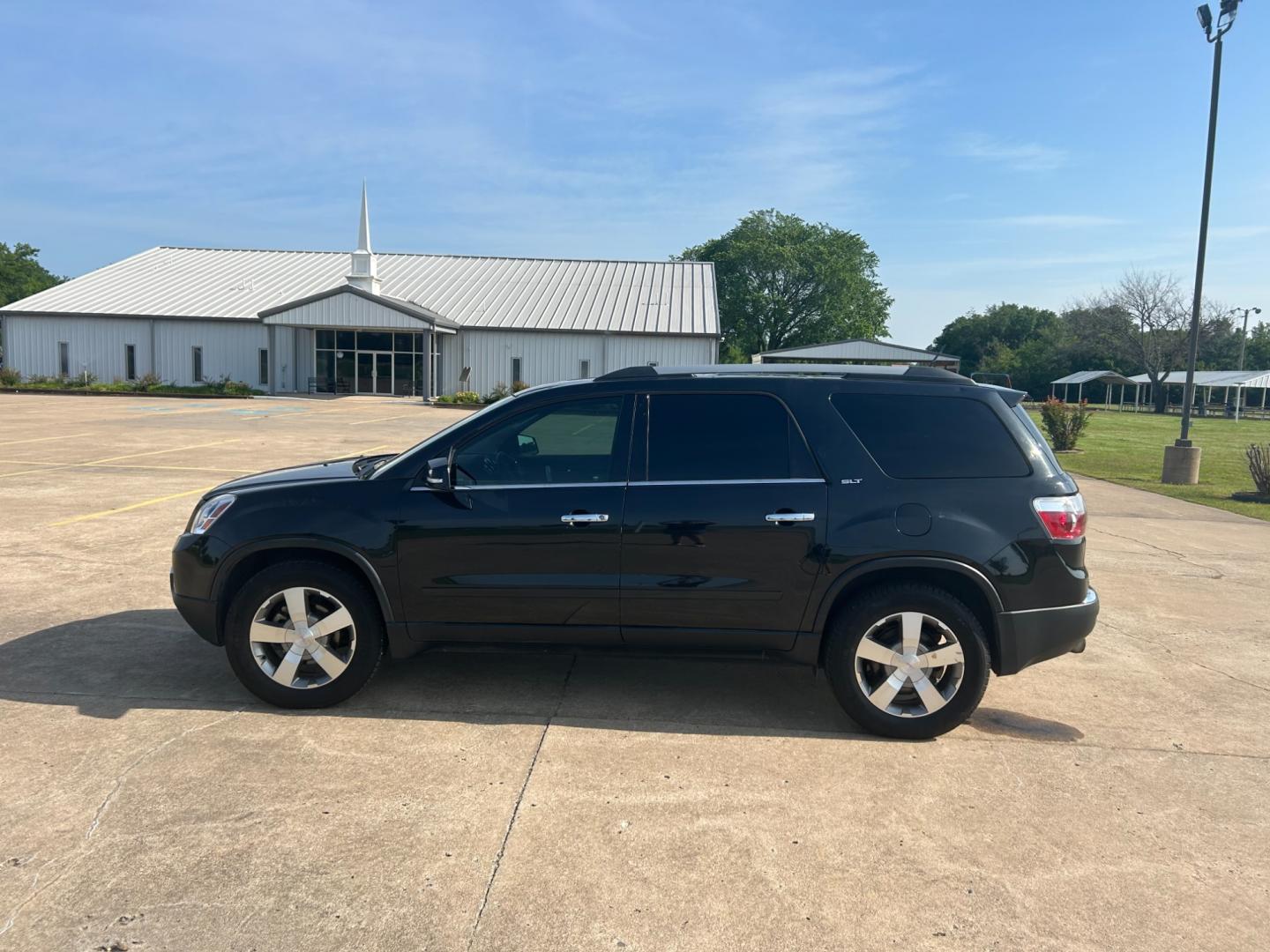 2012 BLACK GMC Acadia SLT-1 FWD (1GKKRRED3CJ) with an 3.6L V6 DOHC 24V engine, 6-Speed Automatic transmission, located at 17760 Hwy 62, Morris, OK, 74445, (918) 733-4887, 35.609104, -95.877060 - 2012 GMC ACADIA SLT-1 FWD FEATURES POWER WINDOWS, POWER LOCKS, POWER SEATS, POWER MIRRORS, CD PLAYER, AUXILLARY PORT, AM/FM STEREO, HEATED SEATS, CRUISE CONTROL, TRACTION CONTROL, BACKUP CAMERA. CLEAN TITLE WITH 136,854 MILES. MICHELIN 255/60R16 TIRES. *******DOES HAVE SCRATCHES AS SHOWN IN PICTURES - Photo#7