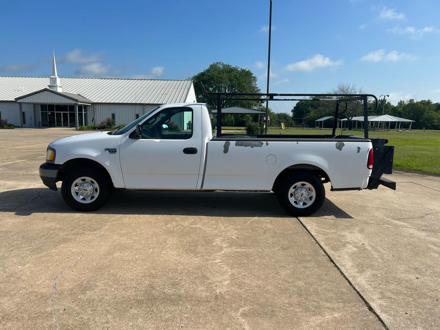 2001 Ford F-150 XL Long Bed 2WD (1FTPF17M01K) with an 5.4L V8 SOHC 16V engine, located at 17760 Hwy 62, Morris, OK, 74445, (918) 733-4887, 35.609104, -95.877060 - 2001 FORD F-150 XL LONG BED 2WD DEDICATED CNG (ONLY RUNS ON COMPRESSED NATURAL GAS) ($1.47 PER GALLON!). IT FEATURES LIFT GATE, MANUAL SEATS, MANUAL LOCKS, MANUAL WINDOWS, MANUAL MIRRORS, AM/FM STEREO, CASSETTE PLAYER, BED LINER. A PREMIER ALTERNATIVE FUEL CONVERSION THAT IS EPA-APPROVED. EXTREMELY - Photo#7