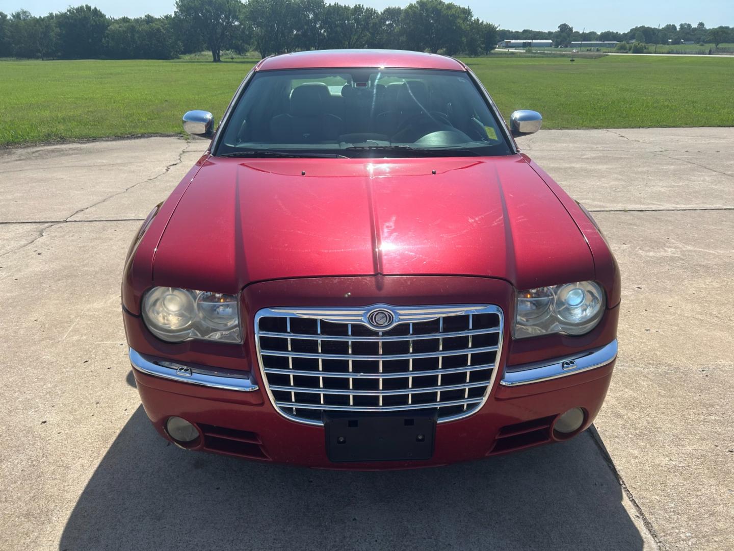 2006 RED Chrysler 300 C (2C3LA63H76H) with an 5.7L V8 OHV 16V engine, 5-Speed Automatic Overdrive transmission, located at 17760 Hwy 62, Morris, OK, 74445, (918) 733-4887, 35.609104, -95.877060 - 2006 CHRYSLER 300 C FEATURES POWER SEATS, POWER WINDOWS, POWER LOCKS, POWER MIRRORS, AM/FM STEREO, CD PLAYER, CASSETTE PLAYER, DUAL CLIMATE CONTROL, HEATED SEATS, SUNROOF, LEATHER SEATS. 152,338 MILES WITH 225/60R18 TIRES. ******DOES HAVE A REBUILT TITLE******** $6900 CALL RUSS OR JONA AT 91 - Photo#1