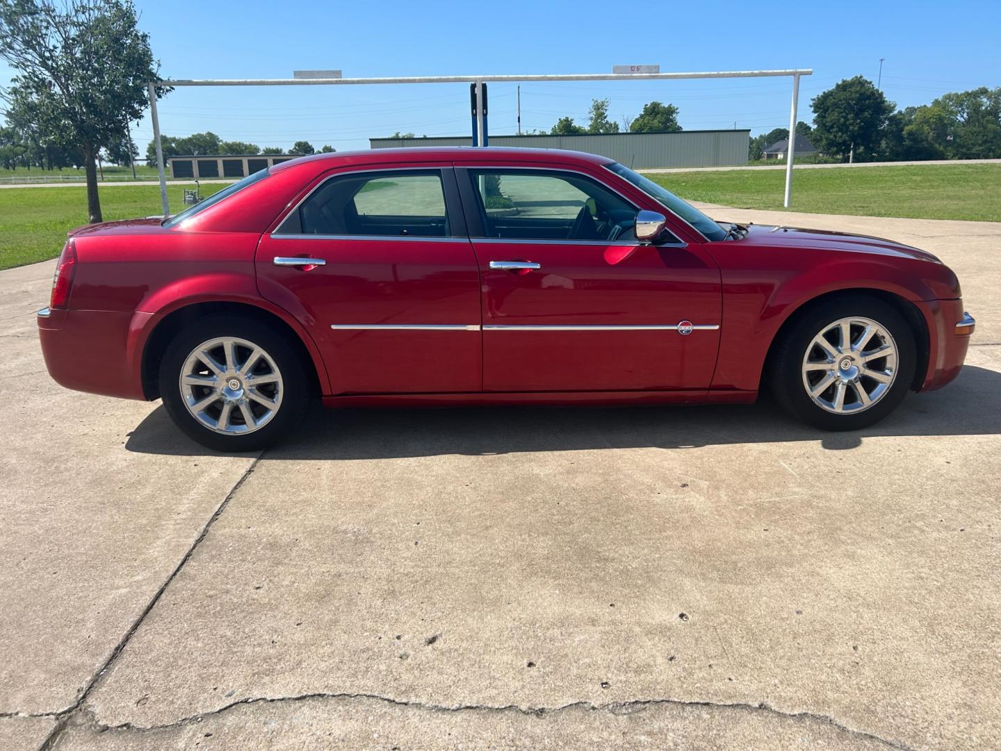 2006 RED Chrysler 300 C (2C3LA63H76H) with an 5.7L V8 OHV 16V engine, 5-Speed Automatic Overdrive transmission, located at 17760 Hwy 62, Morris, OK, 74445, (918) 733-4887, 35.609104, -95.877060 - 2006 CHRYSLER 300 C FEATURES POWER SEATS, POWER WINDOWS, POWER LOCKS, POWER MIRRORS, AM/FM STEREO, CD PLAYER, CASSETTE PLAYER, DUAL CLIMATE CONTROL, HEATED SEATS, SUNROOF, LEATHER SEATS. 152,338 MILES WITH 225/60R18 TIRES. ******DOES HAVE A REBUILT TITLE******** $6900 CALL RUSS OR JONA AT 91 - Photo#3