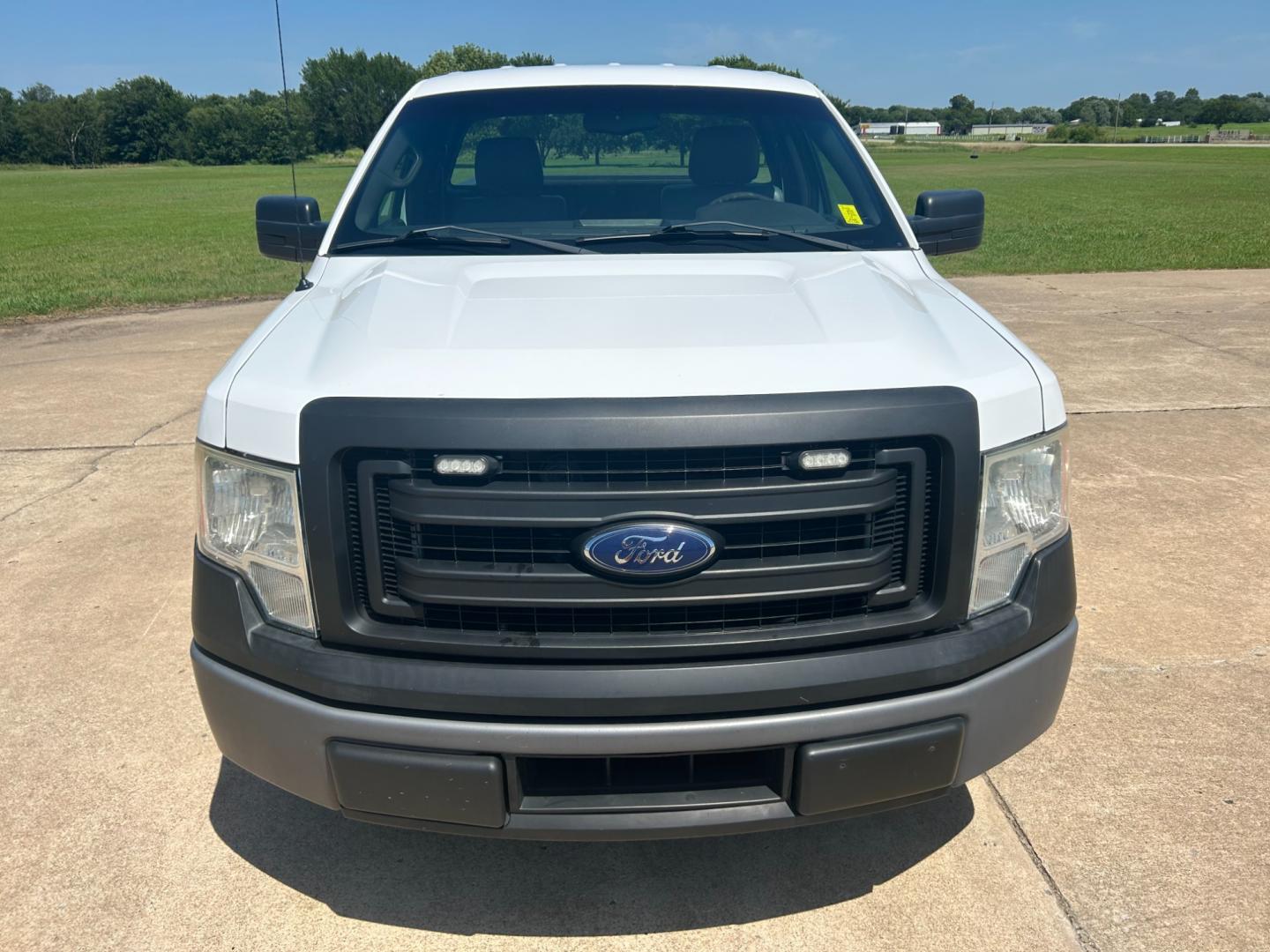 2014 White Ford F-150 STX 6.5-ft. Bed 2WD (1FTMF1CM6EK) with an 3.7L V6 DOHC 24V engine, 6-Speed Automatic transmission, located at 17760 Hwy 62, Morris, OK, 74445, (918) 733-4887, 35.609104, -95.877060 - Photo#1