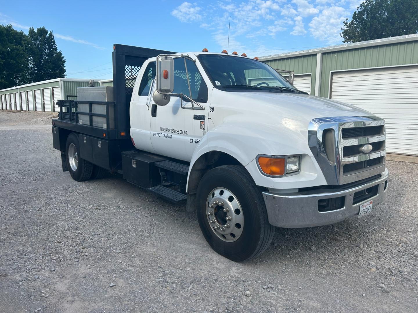 2008 White Ford F-750 SuperCab 2WD DRW (3FRXX75G68V) with an 7.2L L6 DIESEL engine, AUTOMATIC transmission, located at 17760 Hwy 62, Morris, OK, 74445, (918) 733-4887, 35.609104, -95.877060 - 2008 FORD F-750 HAS THE 7.2L ENGINE. THIS TRUCK RUNS ON DIESEL ONLY. FEATURES POWER LOCKS, POWER WINDOWS, MANUAL SEATS, AM/FM STEREO, CD PLAYER, LEATHER SEATS, CUSTOM BED, WITH LOTS OF STORAGE 233,874 MILES WITH A CLEAN TITLE AND FREE CARFAX REPORT $29,500 CALL RUSS OR JONA AT 918-733-4887 - Photo#2