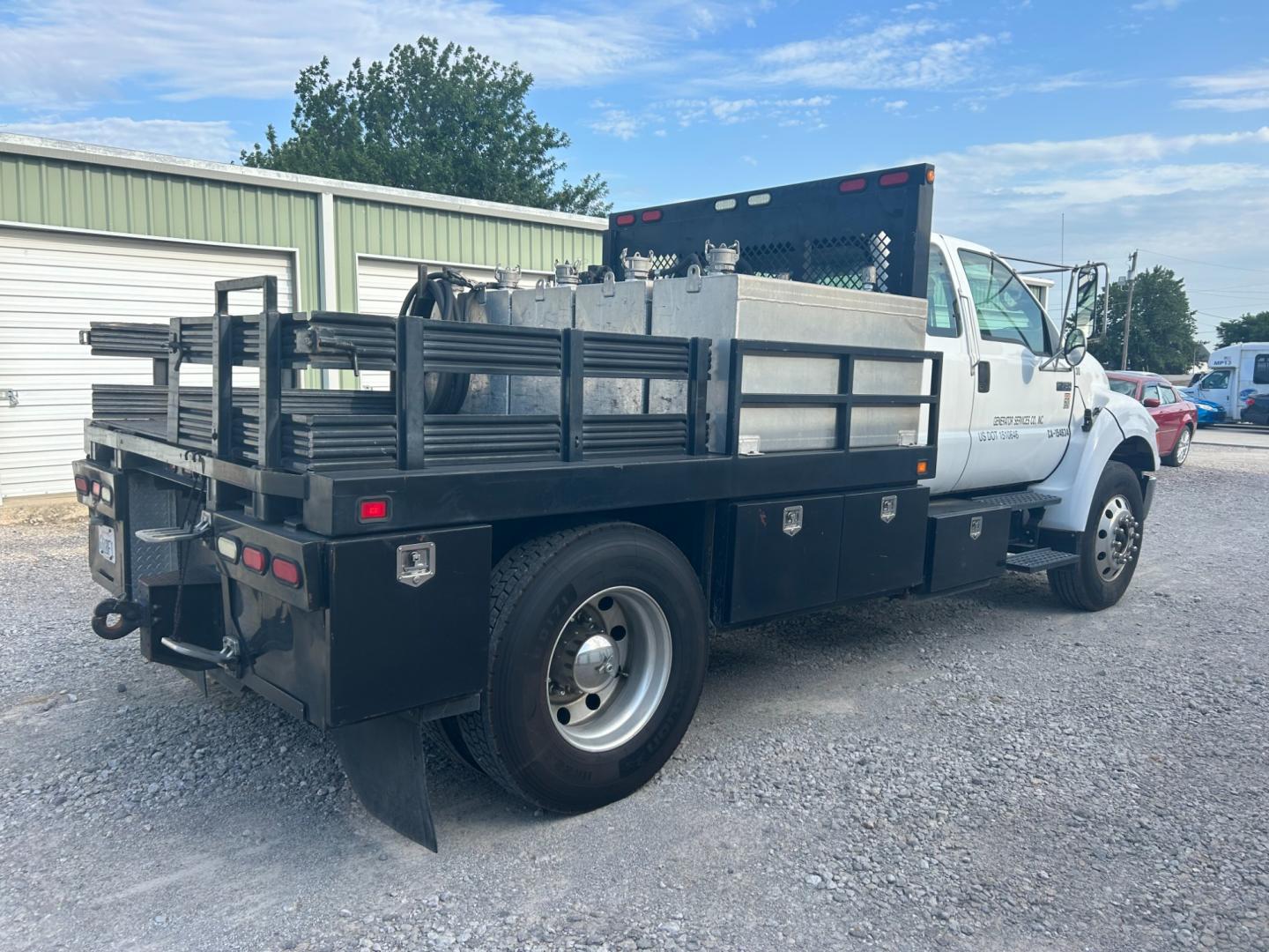 2008 White Ford F-750 SuperCab 2WD DRW (3FRXX75G68V) with an 7.2L L6 DIESEL engine, AUTOMATIC transmission, located at 17760 Hwy 62, Morris, OK, 74445, (918) 733-4887, 35.609104, -95.877060 - 2008 FORD F-750 HAS THE 7.2L ENGINE. THIS TRUCK RUNS ON DIESEL ONLY. FEATURES POWER LOCKS, POWER WINDOWS, MANUAL SEATS, AM/FM STEREO, CD PLAYER, LEATHER SEATS, CUSTOM BED, WITH LOTS OF STORAGE 233,874 MILES WITH A CLEAN TITLE AND FREE CARFAX REPORT $29,500 CALL RUSS OR JONA AT 918-733-4887 - Photo#3