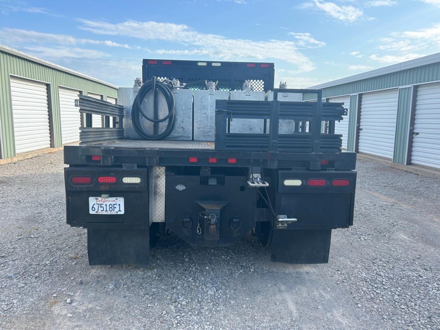 2008 White Ford F-750 SuperCab 2WD DRW (3FRXX75G68V) with an 7.2L L6 DIESEL engine, AUTOMATIC transmission, located at 17760 Hwy 62, Morris, OK, 74445, (918) 733-4887, 35.609104, -95.877060 - 2008 FORD F-750 HAS THE 7.2L ENGINE. THIS TRUCK RUNS ON DIESEL ONLY. FEATURES POWER LOCKS, POWER WINDOWS, MANUAL SEATS, AM/FM STEREO, CD PLAYER, LEATHER SEATS, CUSTOM BED, WITH LOTS OF STORAGE 233,874 MILES WITH A CLEAN TITLE AND FREE CARFAX REPORT $29,500 CALL RUSS OR JONA AT 918-733-4887 - Photo#4