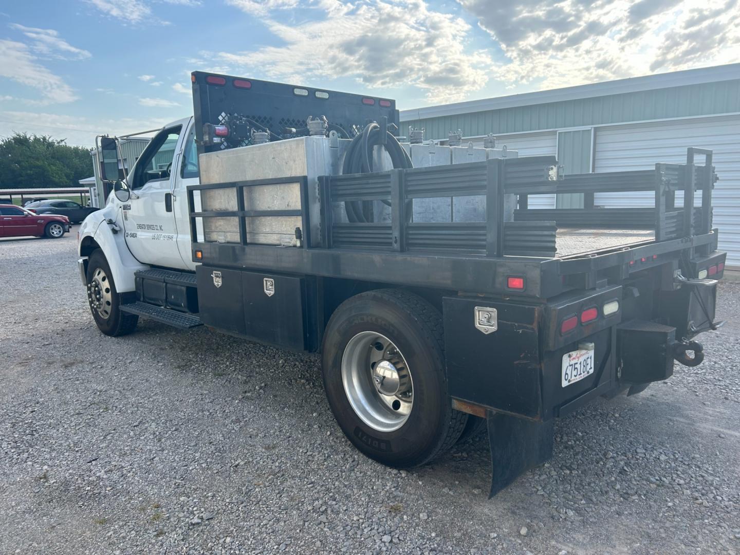 2008 White Ford F-750 SuperCab 2WD DRW (3FRXX75G68V) with an 7.2L L6 DIESEL engine, AUTOMATIC transmission, located at 17760 Hwy 62, Morris, OK, 74445, (918) 733-4887, 35.609104, -95.877060 - 2008 FORD F-750 HAS THE 7.2L ENGINE. THIS TRUCK RUNS ON DIESEL ONLY. FEATURES POWER LOCKS, POWER WINDOWS, MANUAL SEATS, AM/FM STEREO, CD PLAYER, LEATHER SEATS, CUSTOM BED, WITH LOTS OF STORAGE 233,874 MILES WITH A CLEAN TITLE AND FREE CARFAX REPORT $29,500 CALL RUSS OR JONA AT 918-733-4887 - Photo#5