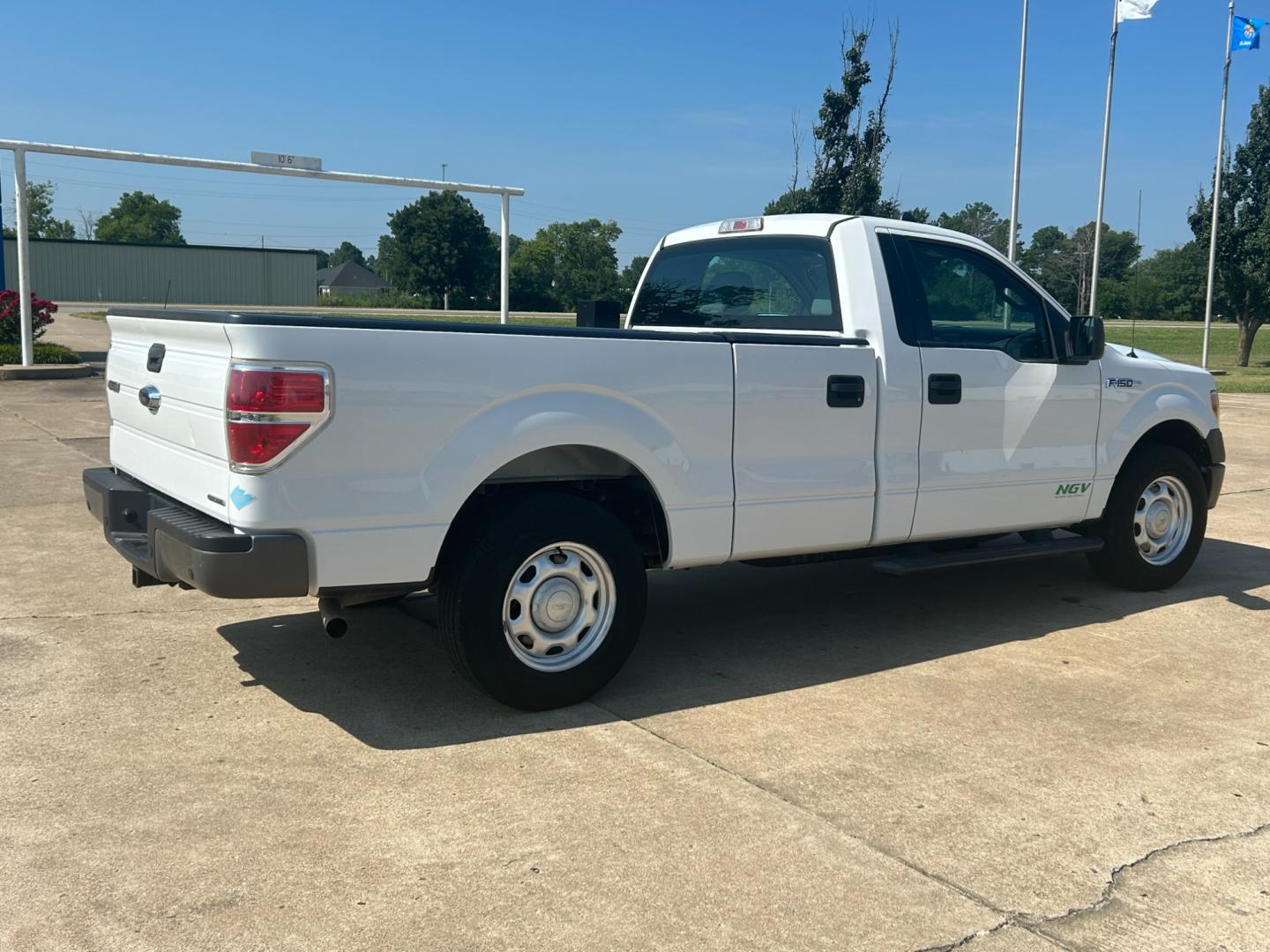 2014 Ford F-150 (1FTMF1CM3EK) with an 3.7L V6 DOHC 24V engine, AUTOMATIC transmission, located at 17760 Hwy 62, Morris, OK, 74445, (918) 733-4887, 35.609104, -95.877060 - 2014 FORD F-150 HAS THE 3.7l AND IS RWD. FEATURES POWER LOCKS, POWER WINDOWS, POWER MIRRORS, AM/FM STEREO, SIRIUS STEREO CD PLAYER, AUXILLARY PORT, BACK-UP CAMERA, BED LINER, CRUISE CONTROL, TRACTION CONTROL, MULTI-FUNCTION STEERING CONTROL. A PREMIER ALTERNATIVE FUEL CONVERSION THAT IS EPA-APPROV - Photo#4