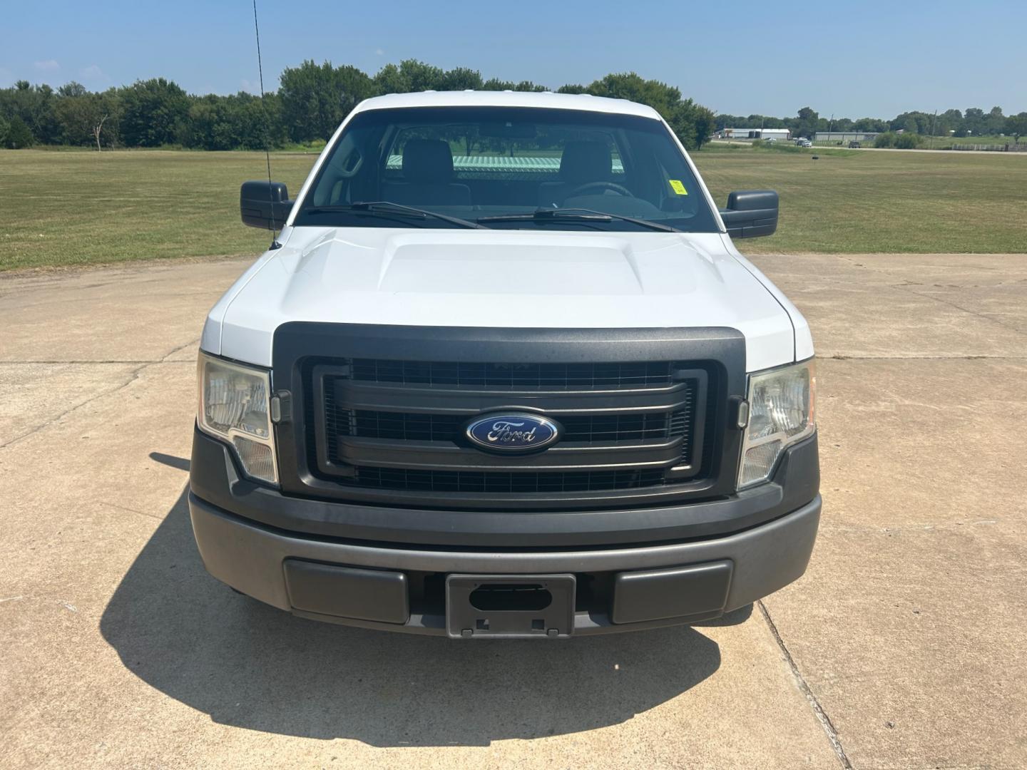 2014 White Ford F-150 STX 6.5-ft. Bed 2WD (1FTMF1CM3EK) with an 3.7L V6 DOHC 24V engine, 6-Speed Automatic transmission, located at 17760 Hwy 62, Morris, OK, 74445, (918) 733-4887, 35.609104, -95.877060 - Photo#1