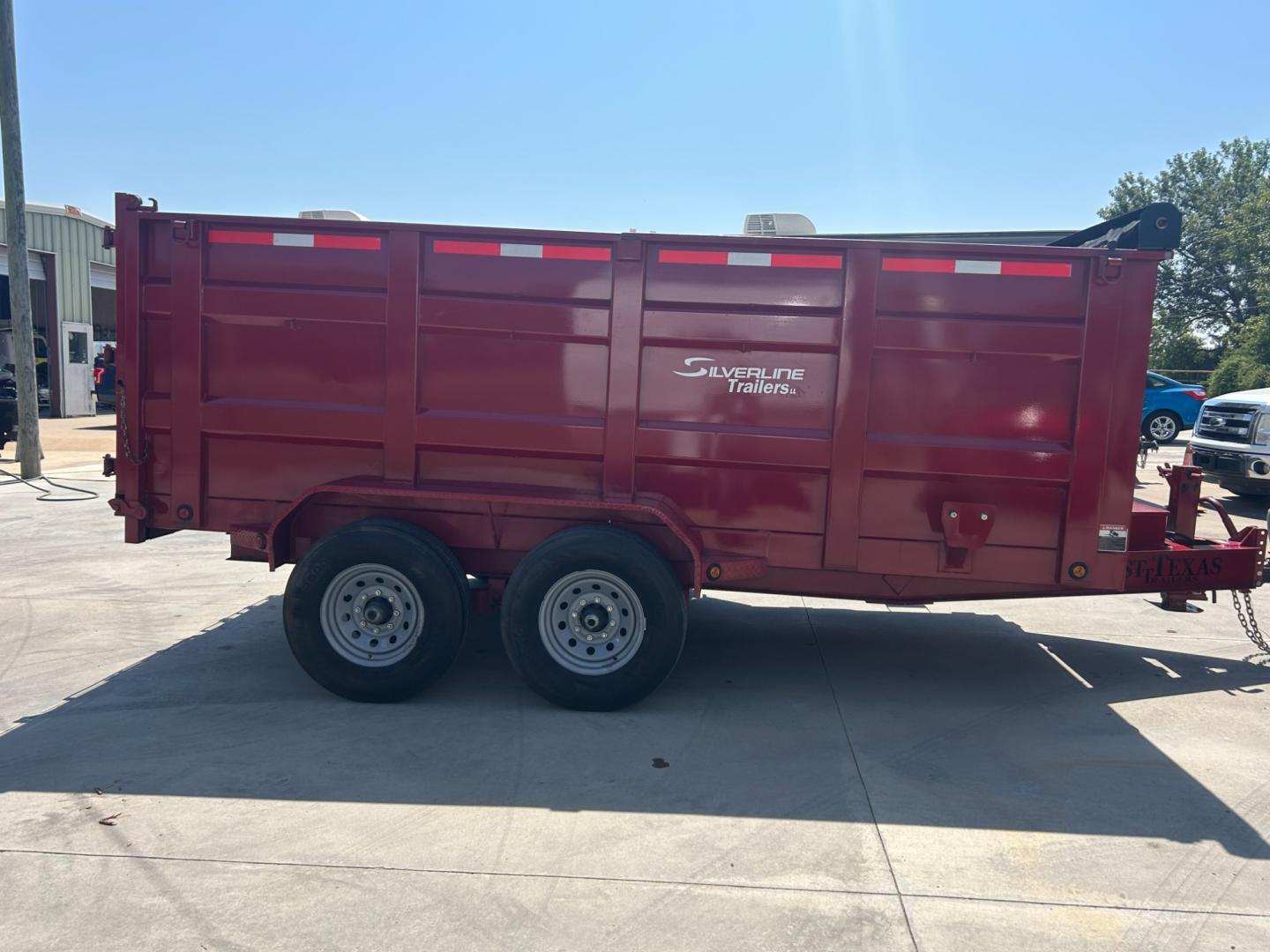 2022 RED EAST TEXAS TRAILER DUMPBED (58SBD1420NE) , located at 17760 Hwy 62, Morris, OK, 74445, 35.609104, -95.877060 - 2022 SILVERLINE TRAILER 83X14 FEATURES 2 7,000 LB DEXTER SPRING AXLES, 2 ELEC FSA BRAKES, COUPLER 2-5/16" ADJUSTABLE (6 HOLE), DIAMOND PLATE FENDERS, 16" CROSS-MEMBERS, 48" DUMP SIDES, 48" 3 WAY GATE, MESH ROLL TARP SYSTEM, JACK SPRING LOADED DROP LEG, 4 3'' D-RINGS, TOOL BOX IN TONGUE, SCISSOR HOIS - Photo#3