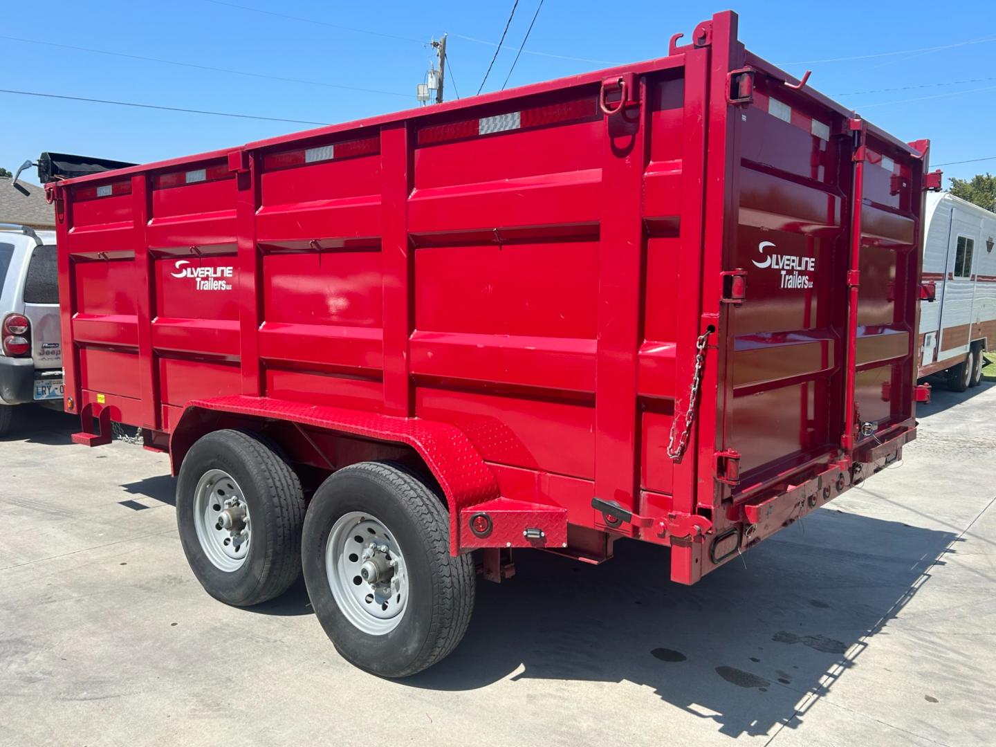 2022 RED EAST TEXAS TRAILER DUMPBED (58SBD1420NE) , located at 17760 Hwy 62, Morris, OK, 74445, 35.609104, -95.877060 - 2022 SILVERLINE TRAILER 83X14 FEATURES 2 7,000 LB DEXTER SPRING AXLES, 2 ELEC FSA BRAKES, COUPLER 2-5/16" ADJUSTABLE (6 HOLE), DIAMOND PLATE FENDERS, 16" CROSS-MEMBERS, 48" DUMP SIDES, 48" 3 WAY GATE, MESH ROLL TARP SYSTEM, JACK SPRING LOADED DROP LEG, 4 3'' D-RINGS, TOOL BOX IN TONGUE, SCISSOR HOIS - Photo#5