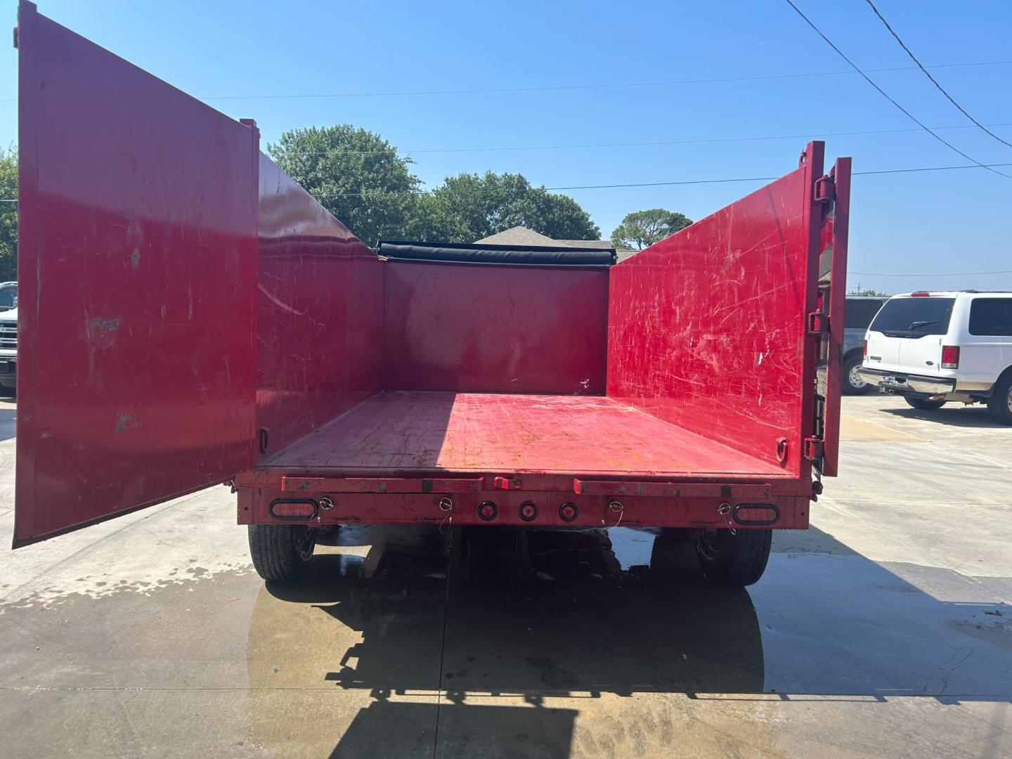 2022 RED EAST TEXAS TRAILER DUMPBED (58SBD1420NE) , located at 17760 Hwy 62, Morris, OK, 74445, 35.609104, -95.877060 - 2022 SILVERLINE TRAILER 83X14 FEATURES 2 7,000 LB DEXTER SPRING AXLES, 2 ELEC FSA BRAKES, COUPLER 2-5/16" ADJUSTABLE (6 HOLE), DIAMOND PLATE FENDERS, 16" CROSS-MEMBERS, 48" DUMP SIDES, 48" 3 WAY GATE, MESH ROLL TARP SYSTEM, JACK SPRING LOADED DROP LEG, 4 3'' D-RINGS, TOOL BOX IN TONGUE, SCISSOR HOIS - Photo#8