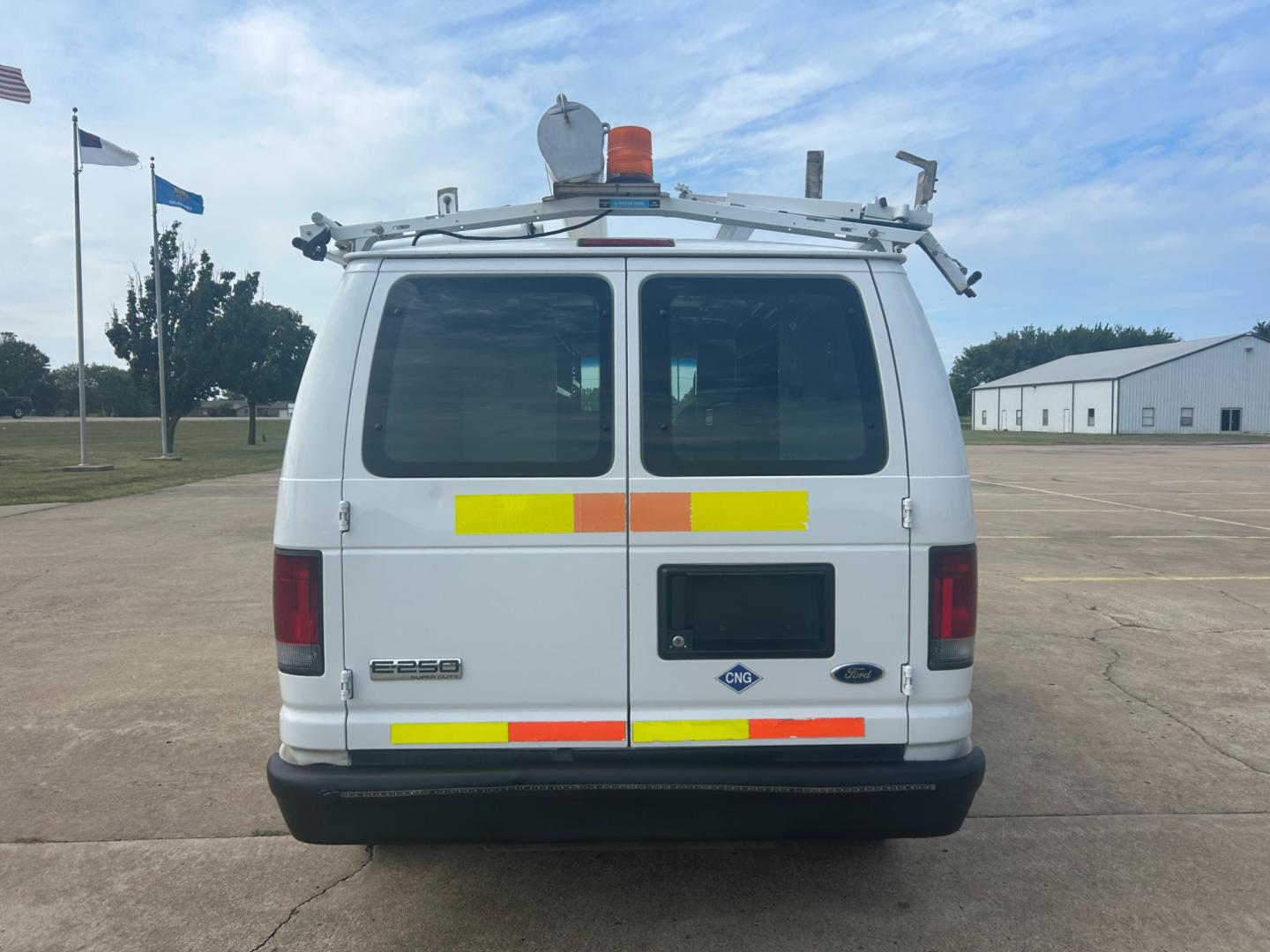 2010 White Ford E-Series Van E-250 (1FTNE2ELXAD) with an 5.4L V8 SOHC 16V engine, 4-Speed Automatic transmission, located at 17760 Hwy 62, Morris, OK, 74445, (918) 733-4887, 35.609104, -95.877060 - Photo#5