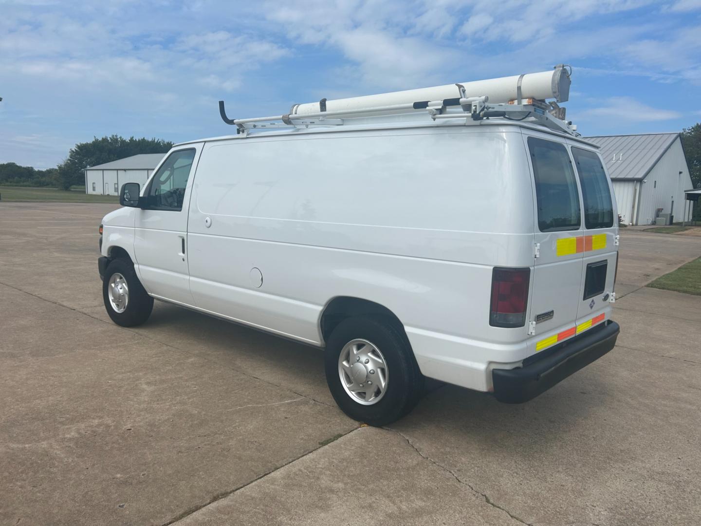 2010 White Ford E-Series Van E-250 (1FTNE2ELXAD) with an 5.4L V8 SOHC 16V engine, 4-Speed Automatic transmission, located at 17760 Hwy 62, Morris, OK, 74445, (918) 733-4887, 35.609104, -95.877060 - Photo#6