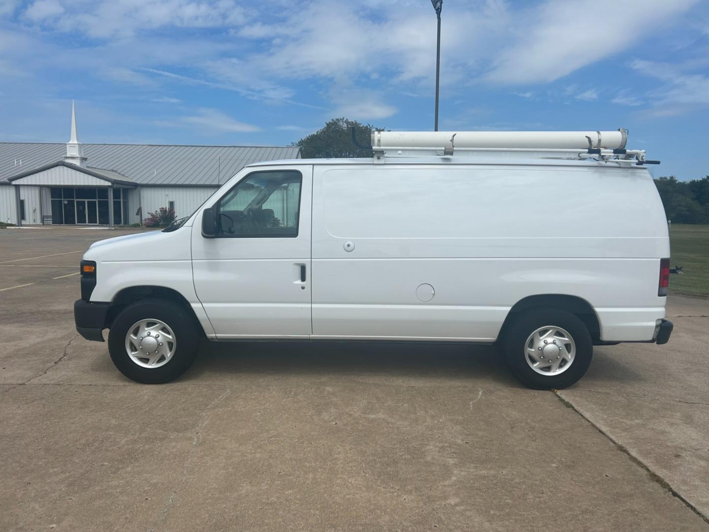 2010 White Ford E-Series Van E-250 (1FTNE2ELXAD) with an 5.4L V8 SOHC 16V engine, 4-Speed Automatic transmission, located at 17760 Hwy 62, Morris, OK, 74445, (918) 733-4887, 35.609104, -95.877060 - Photo#7