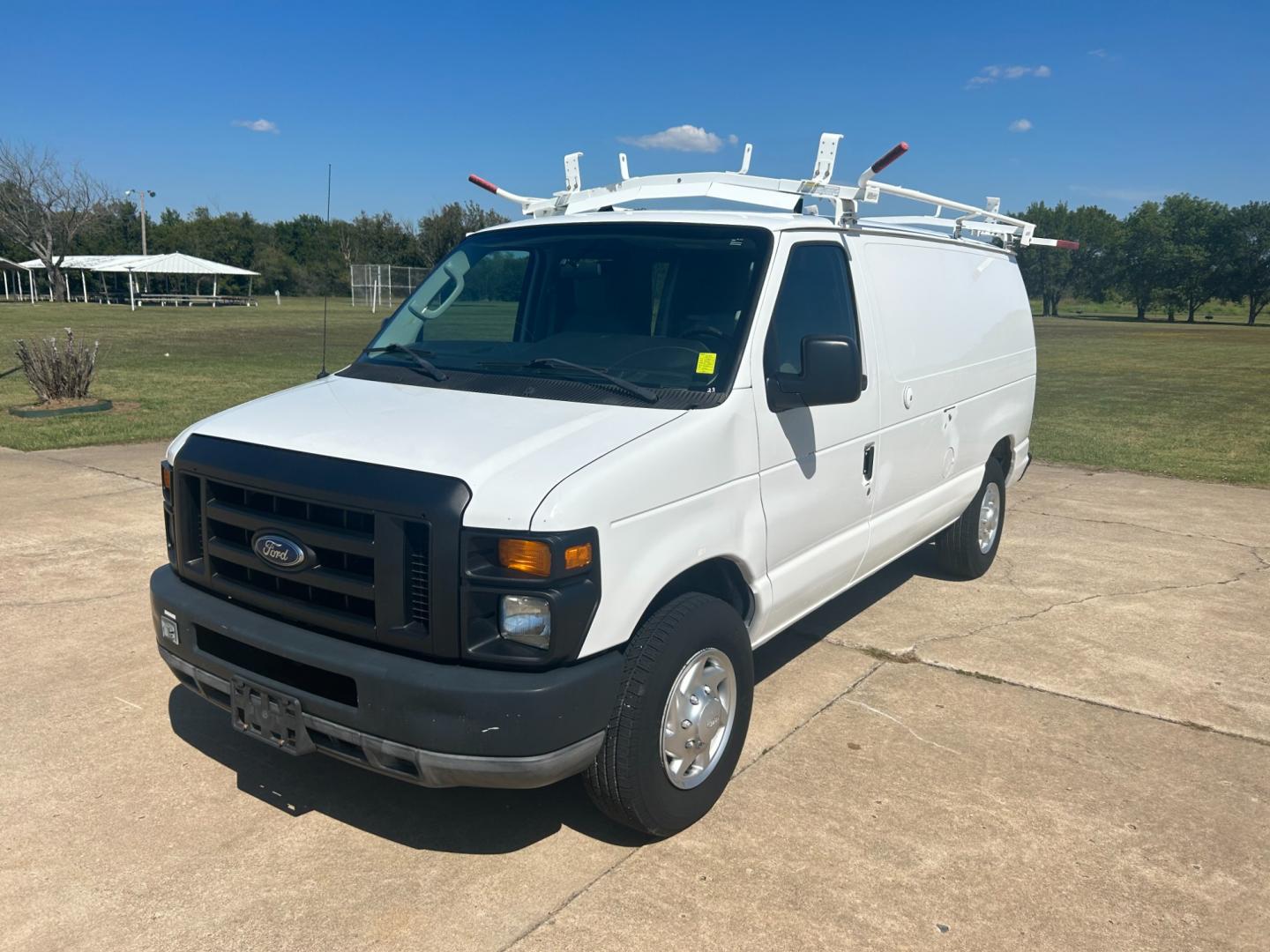 2010 White Ford E-Series Van E-250 (1FTNE2EL9AD) with an 5.4L V8 SOHC 16V engine, 4-Speed Automatic transmission, located at 17760 Hwy 62, Morris, OK, 74445, (918) 733-4887, 35.609104, -95.877060 - Photo#0