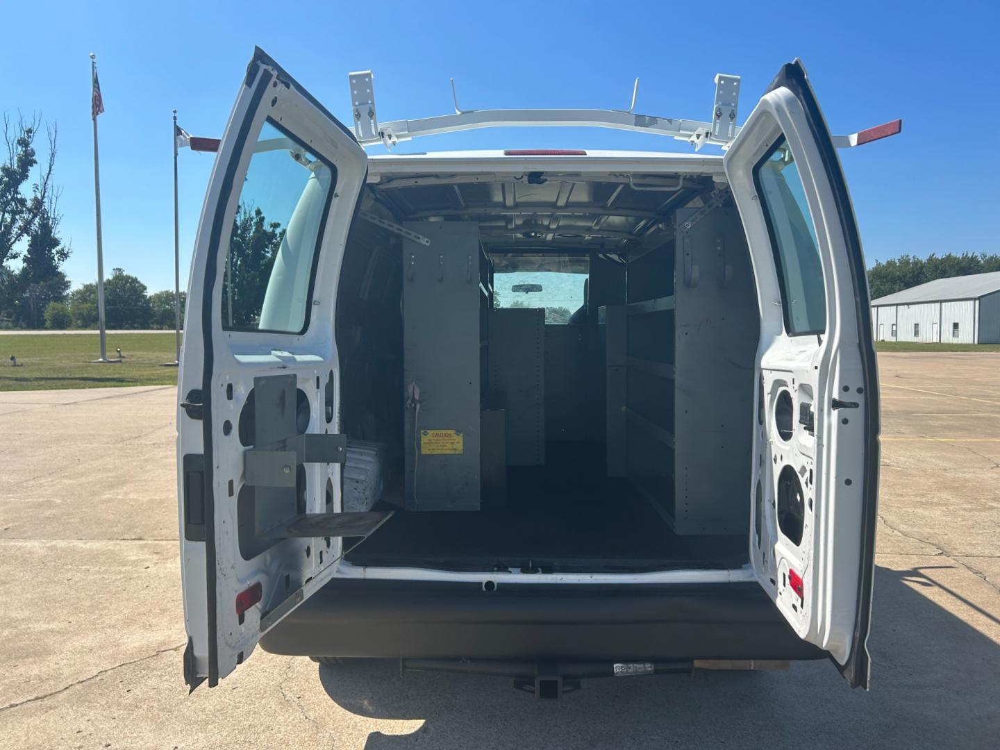 2010 White Ford E-Series Van E-250 (1FTNE2EL9AD) with an 5.4L V8 SOHC 16V engine, 4-Speed Automatic transmission, located at 17760 Hwy 62, Morris, OK, 74445, (918) 733-4887, 35.609104, -95.877060 - Photo#13